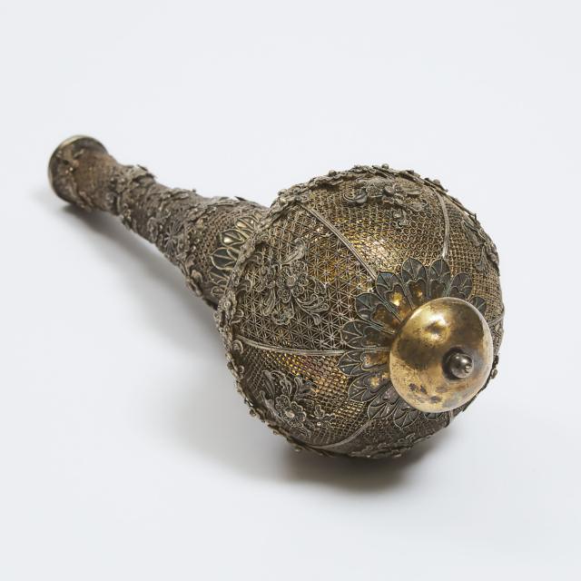 A Silver and Brass Filigree Children's Toy, Late 19th Century