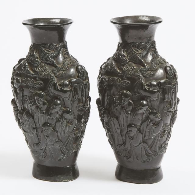 A Pair of Moulded Ceramic 'Eighteen Luohan' Vases, Qianlong Mark, 20th Century