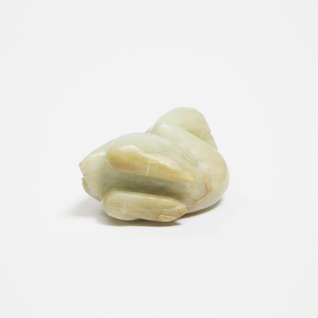 A White and Russet Jade Carving of a Phoenix Holding Lingzhi, Qing Dynasty, 19th Century
