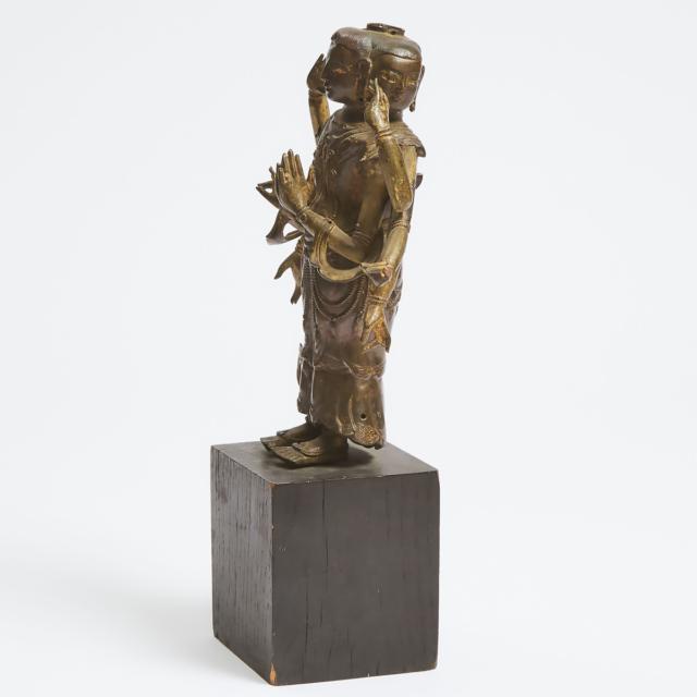 A Tibetan Gilt Bronze Standing Figure of Ushnishavijaya, 18th Century