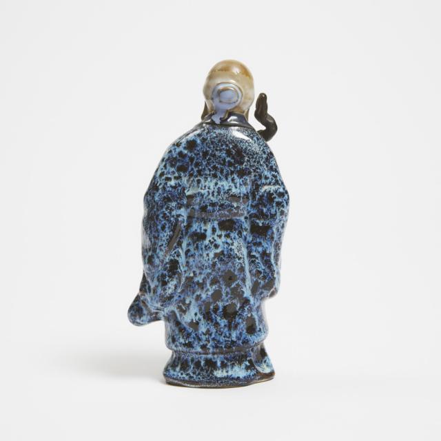 A Chinese Shiwan Flambé Glazed Pottery Figure, Circa 1960-1970