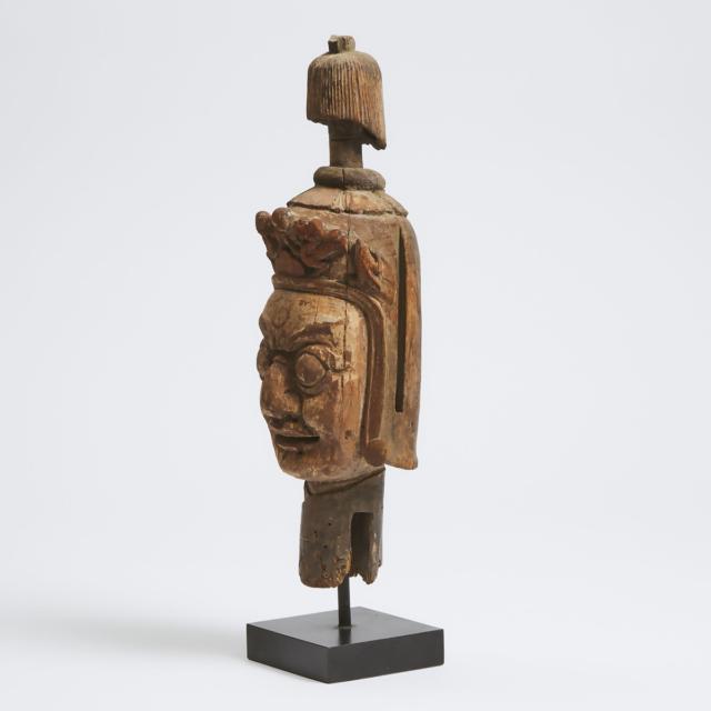 A Sino-Tibetan Carved Wood Head of a Guardian, Ming Dynasty