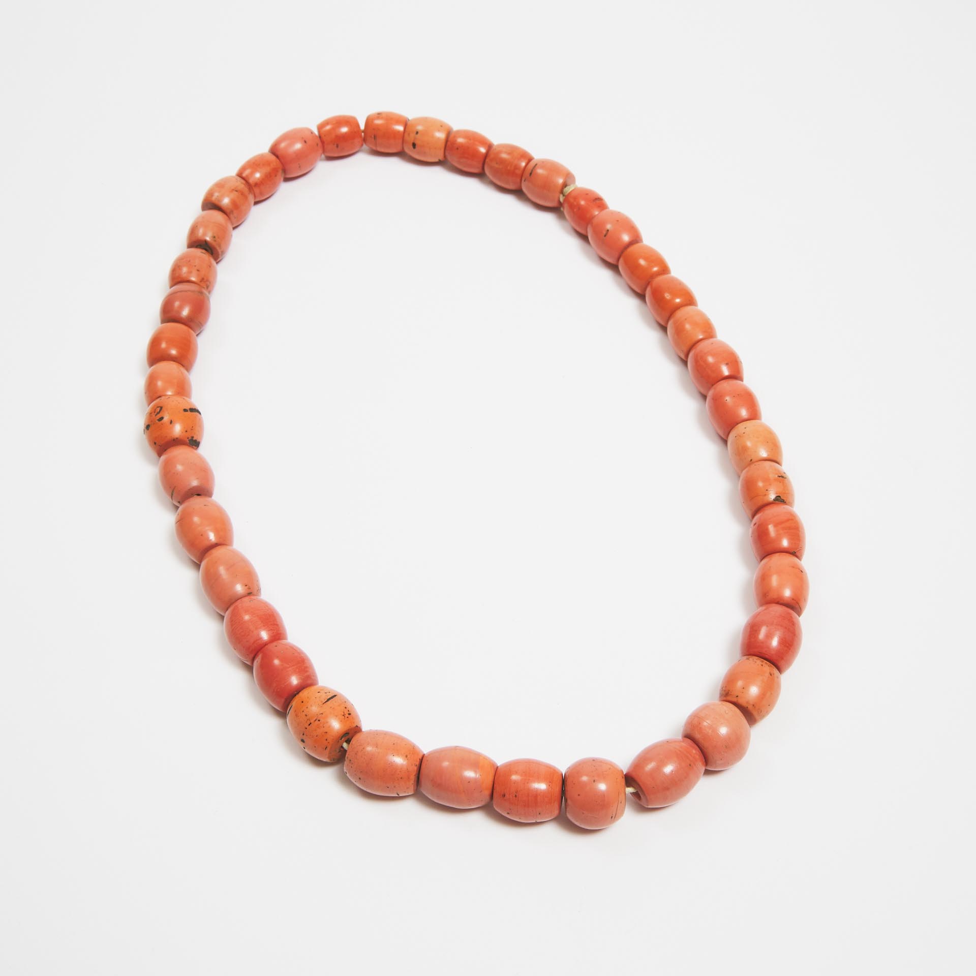 A Necklace of Forty Sherpa Imitation-Coral Glass Beads, 19th Century