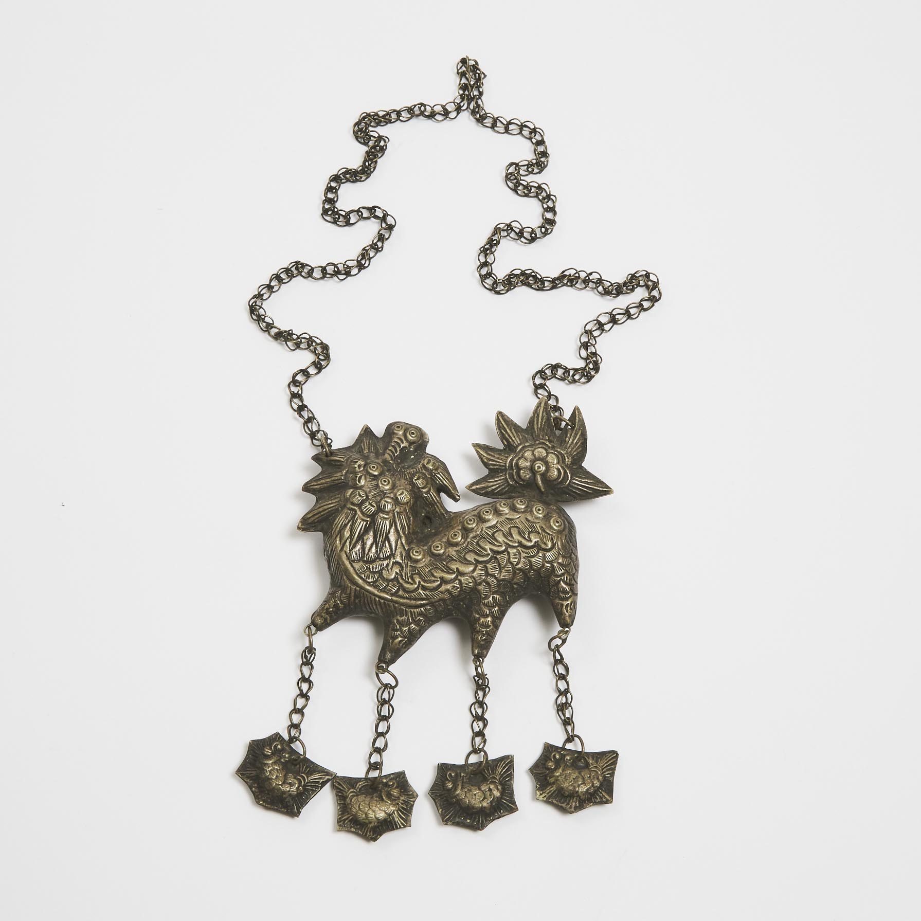 A Chinese Silver 'Qilin' Pendant, 19th/20th Century 