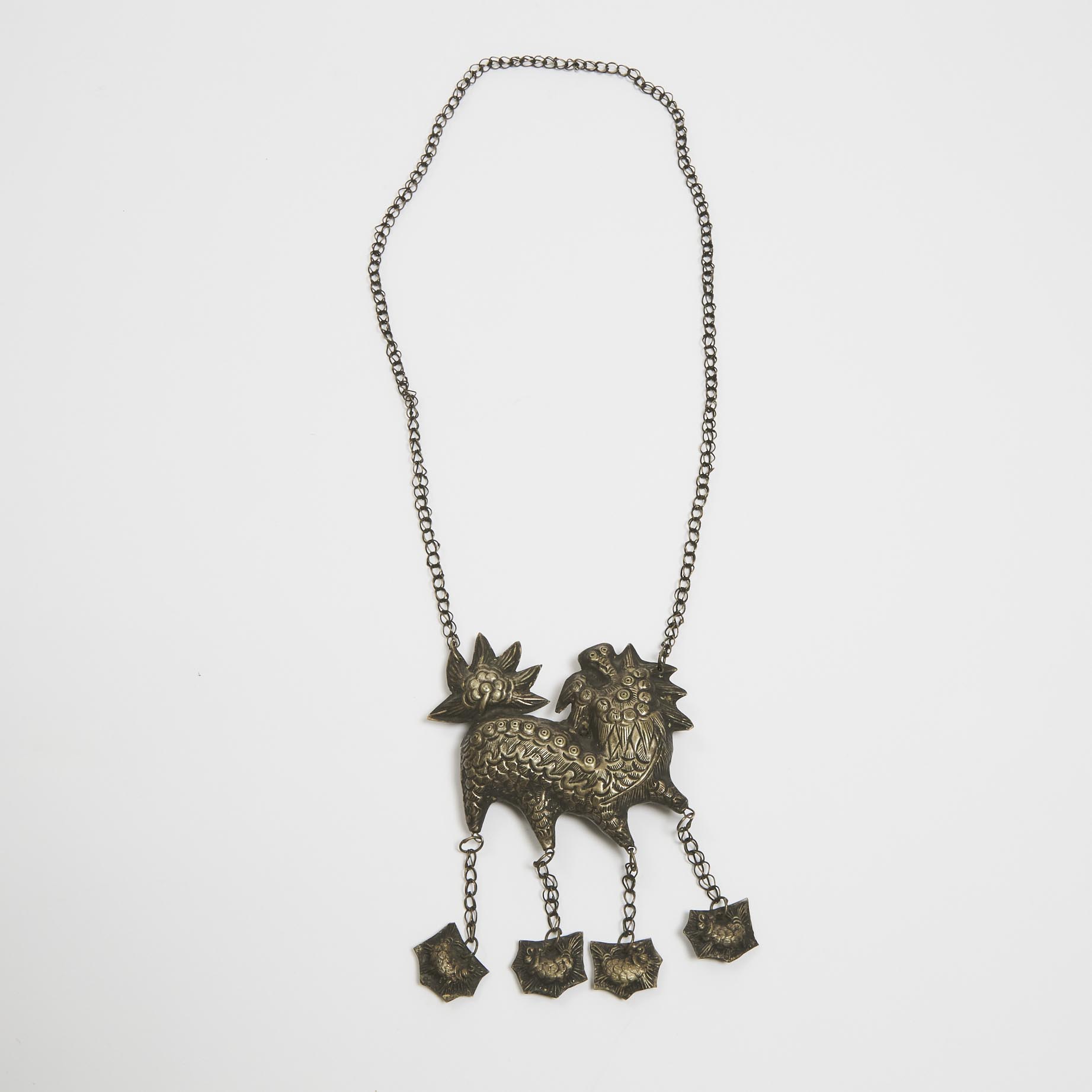 A Chinese Silver 'Qilin' Pendant, 19th/20th Century 
