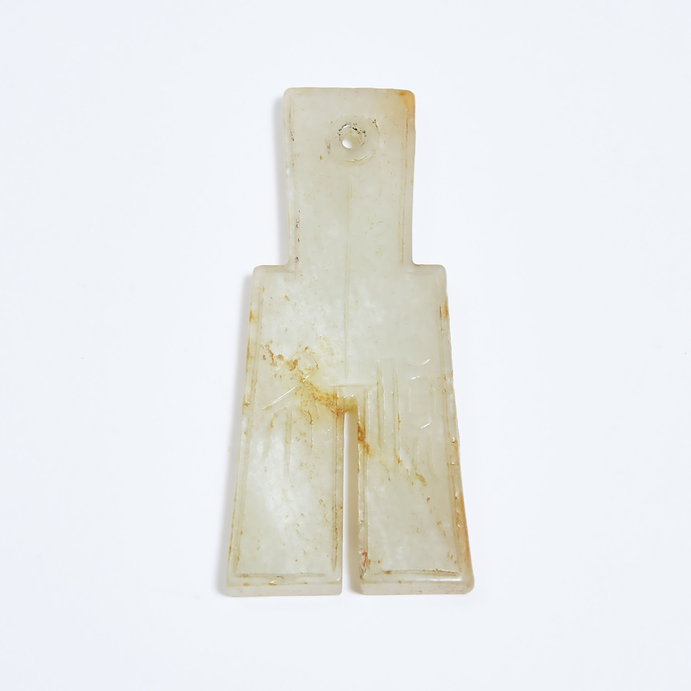 A White and Russet Jade 'Spade-Money' Shaped Plaque, Late Ming/Early Qing Dynasty