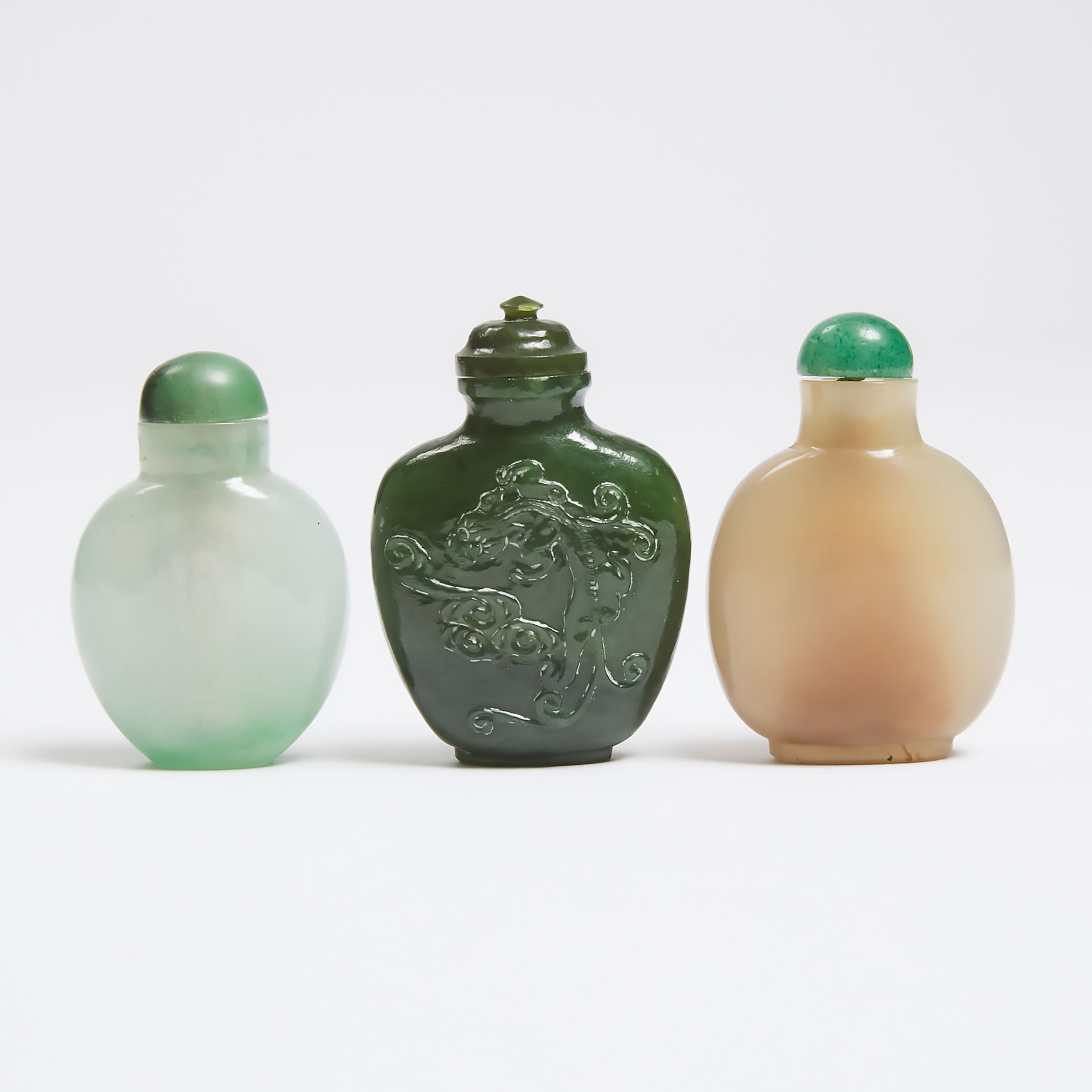 A Jadeite Snuff Bottle, Together With Two Spinach Jade and Agate Snuff Bottles