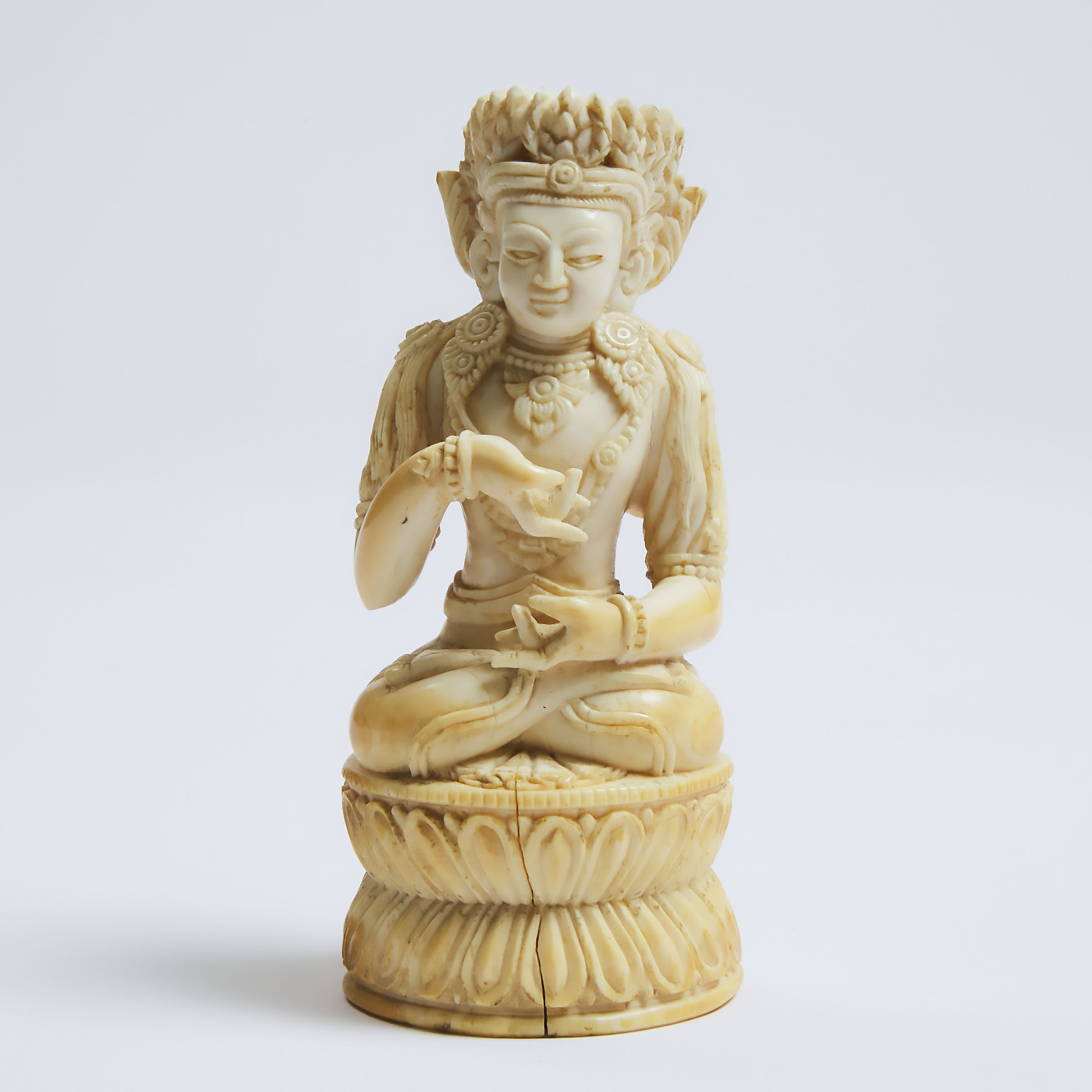 A Tibetan Ivory Figure of Buddha, 18th Century