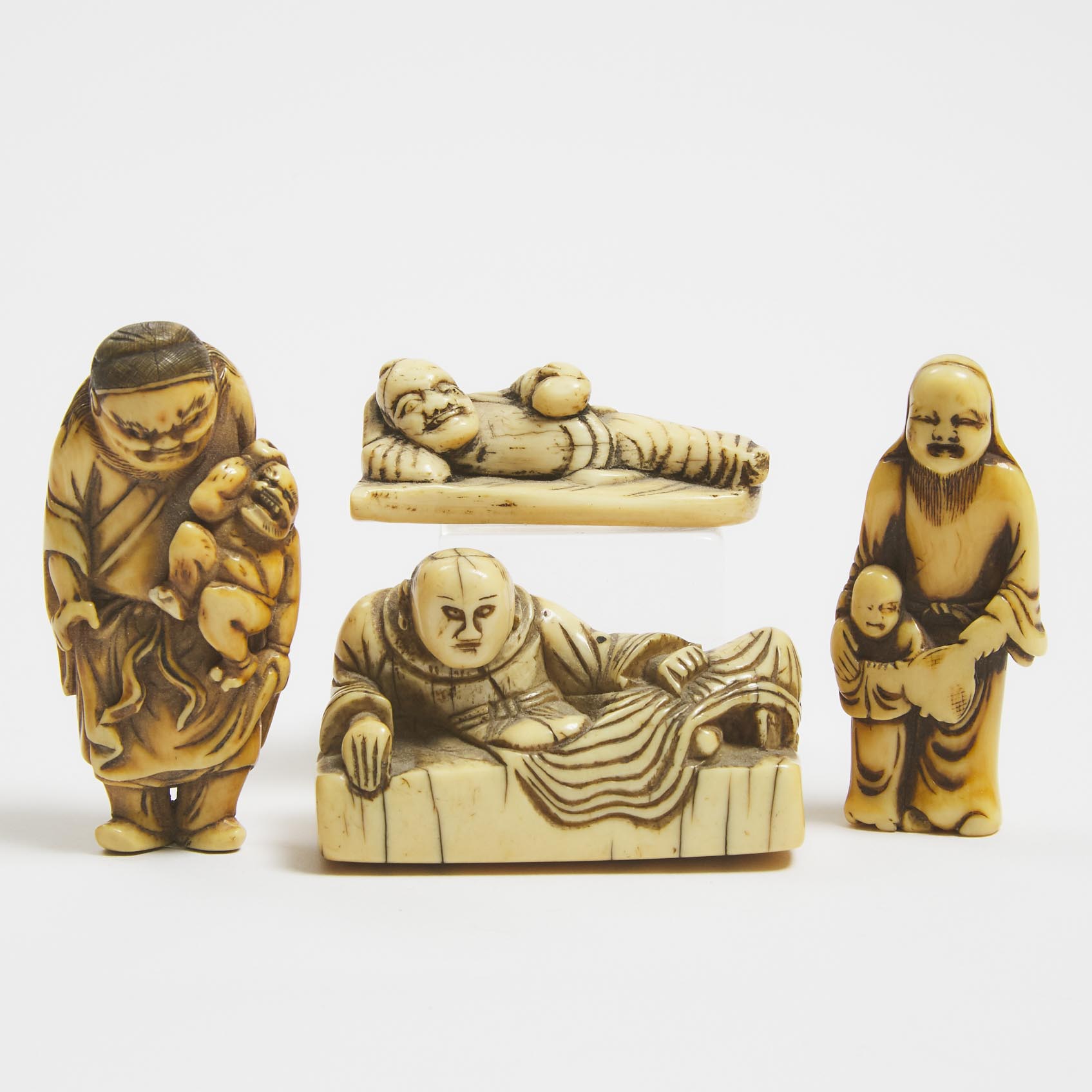 A Group of Ivory Figural Netsuke, Edo Period. 18th/19th Century