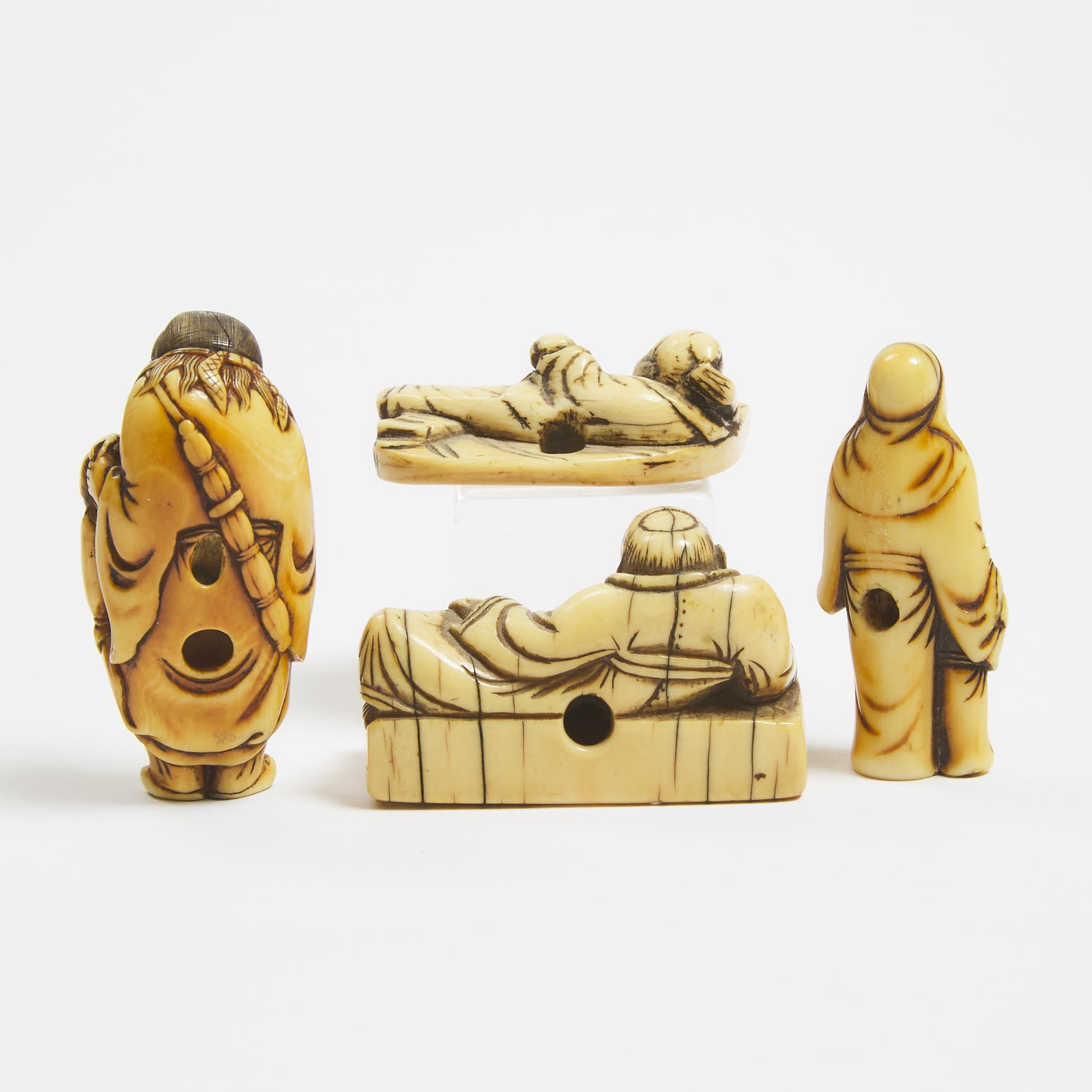 A Group of Ivory Figural Netsuke, Edo Period. 18th/19th Century