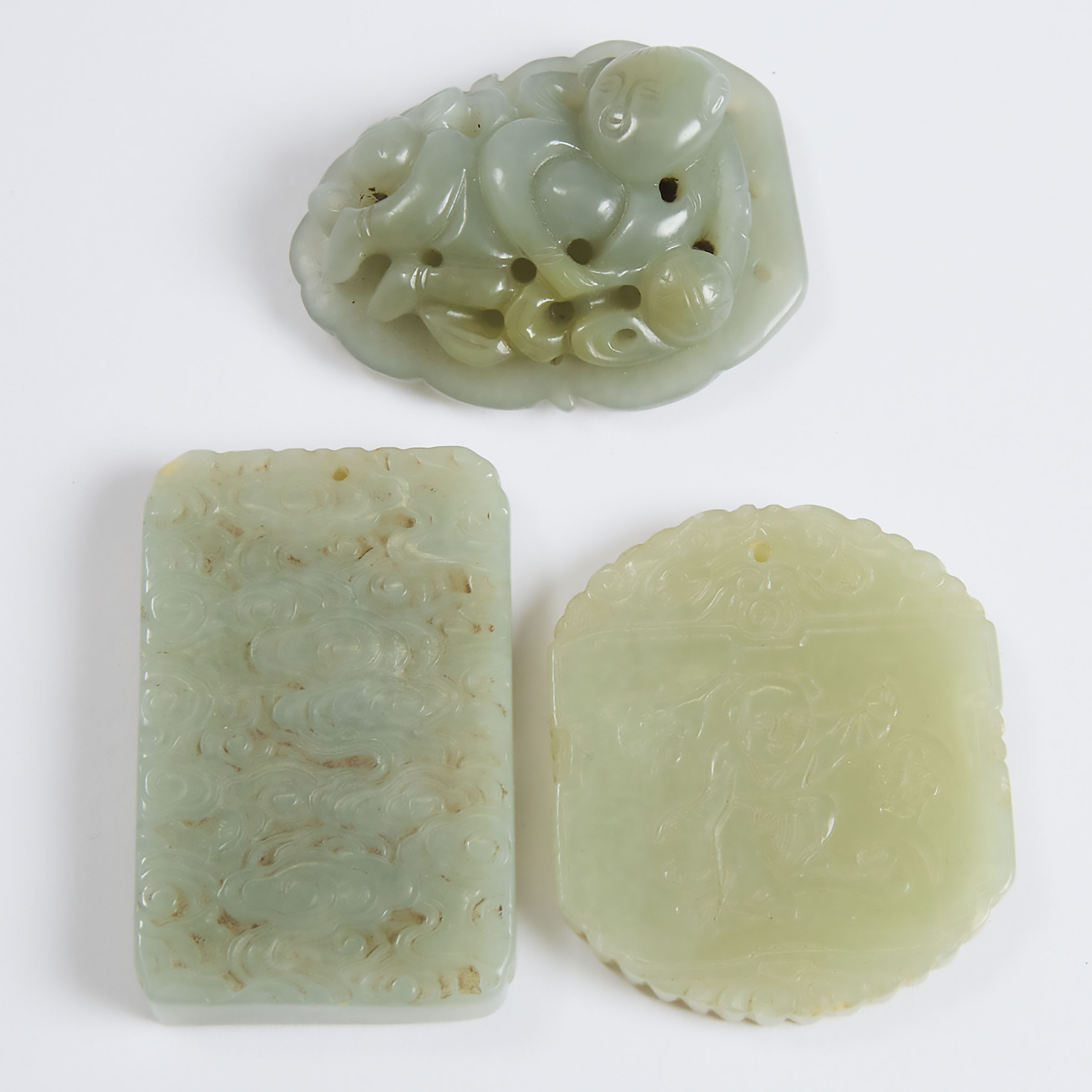 A Group of Three Celadon Jade Plaques