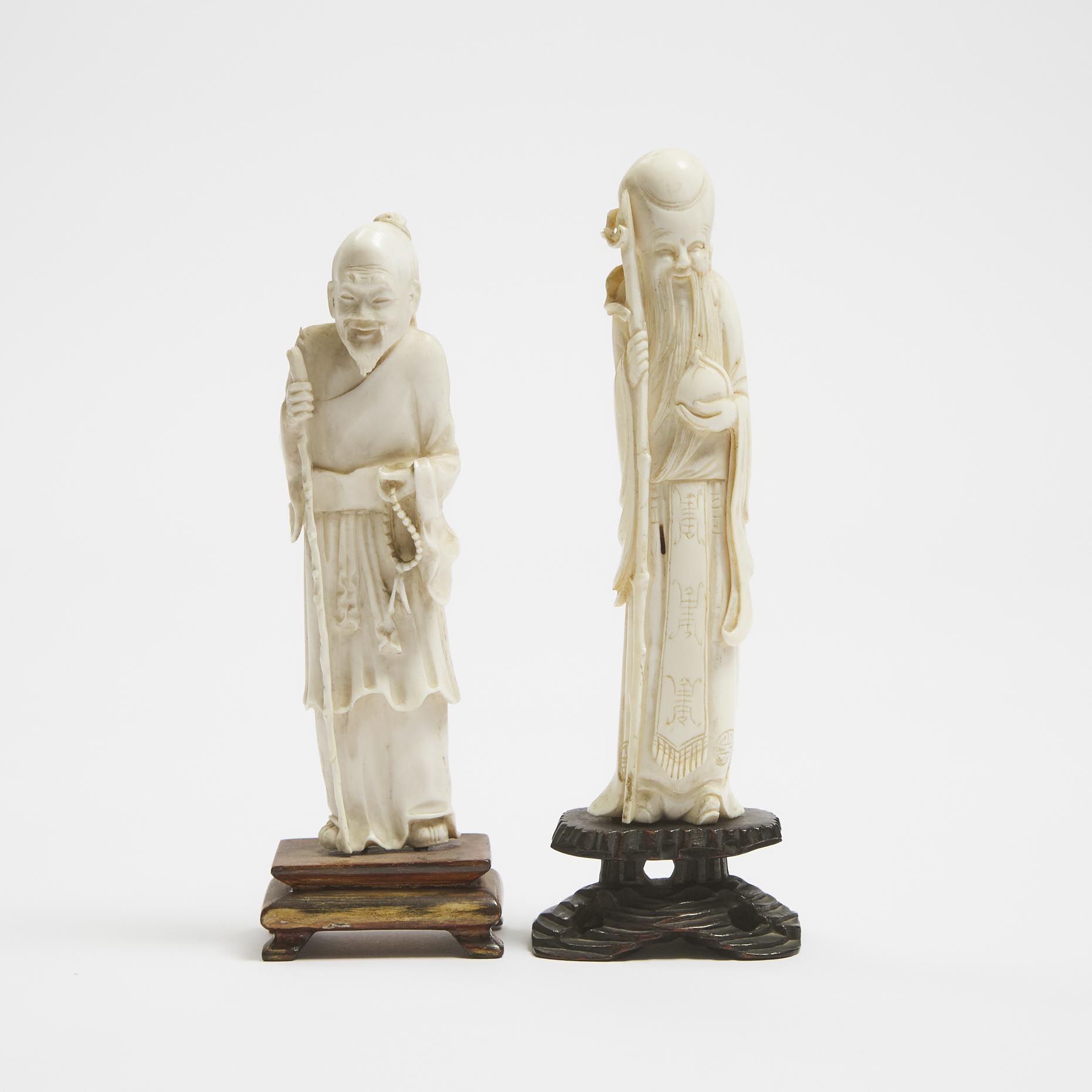 Two Chinese Carved Ivory Figures of Shoulao and an Immortal