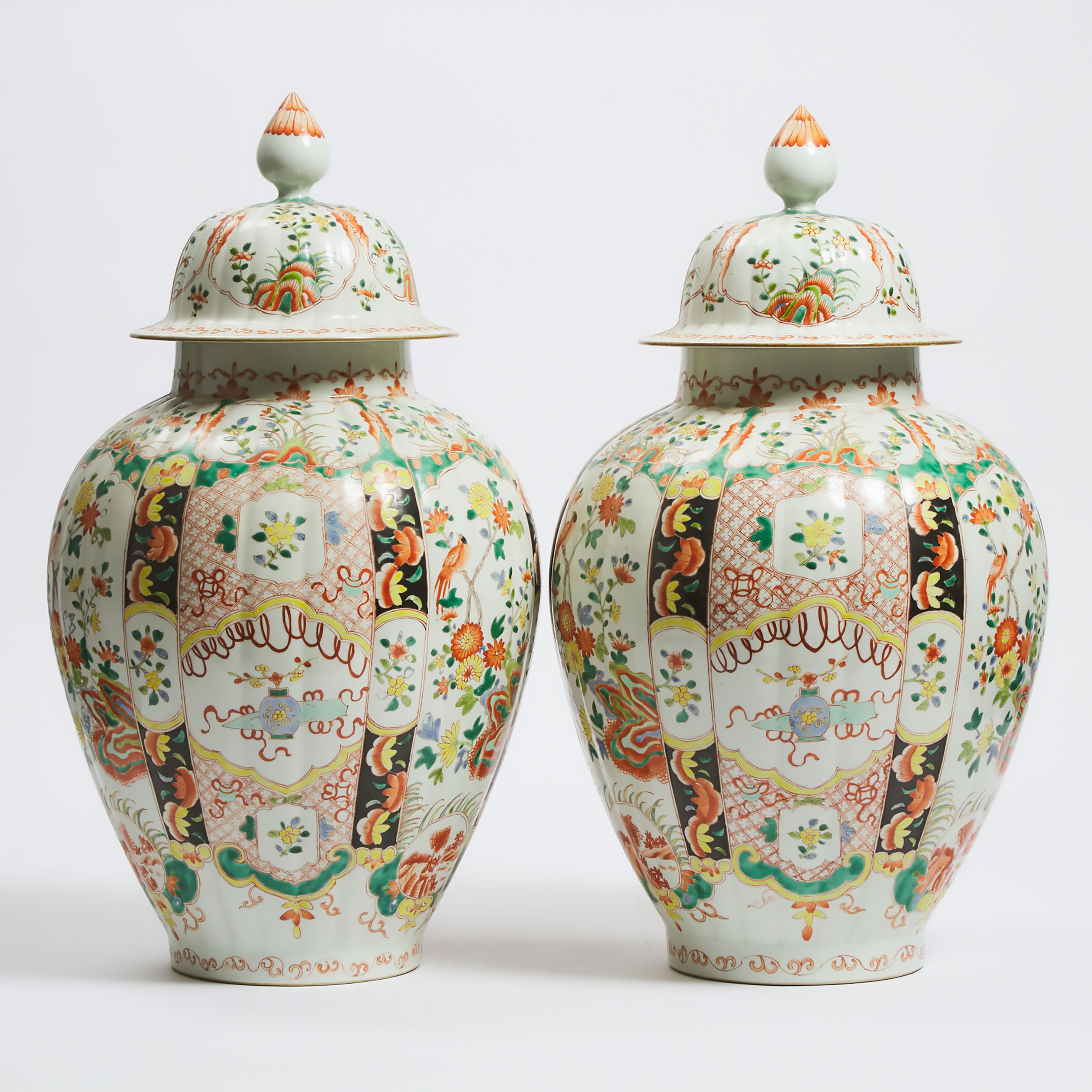 A Pair of Chinese Kangxi-Style Lobed Famille Rose Vases and Covers