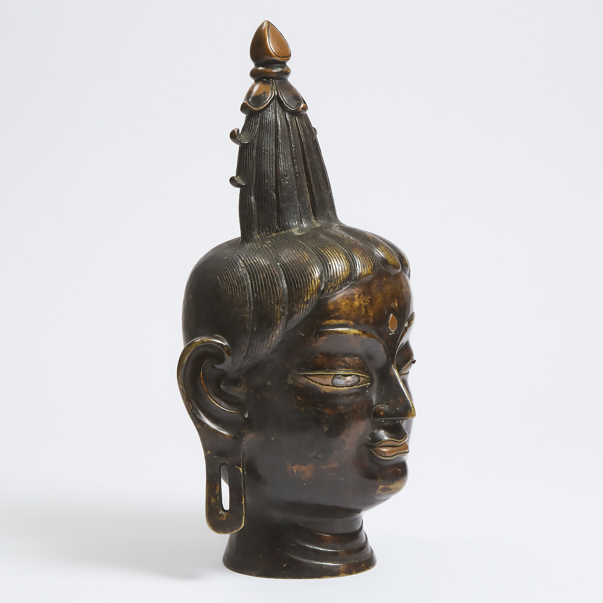 A Large Bronze Head of Buddha, Bhutan, 19th Century