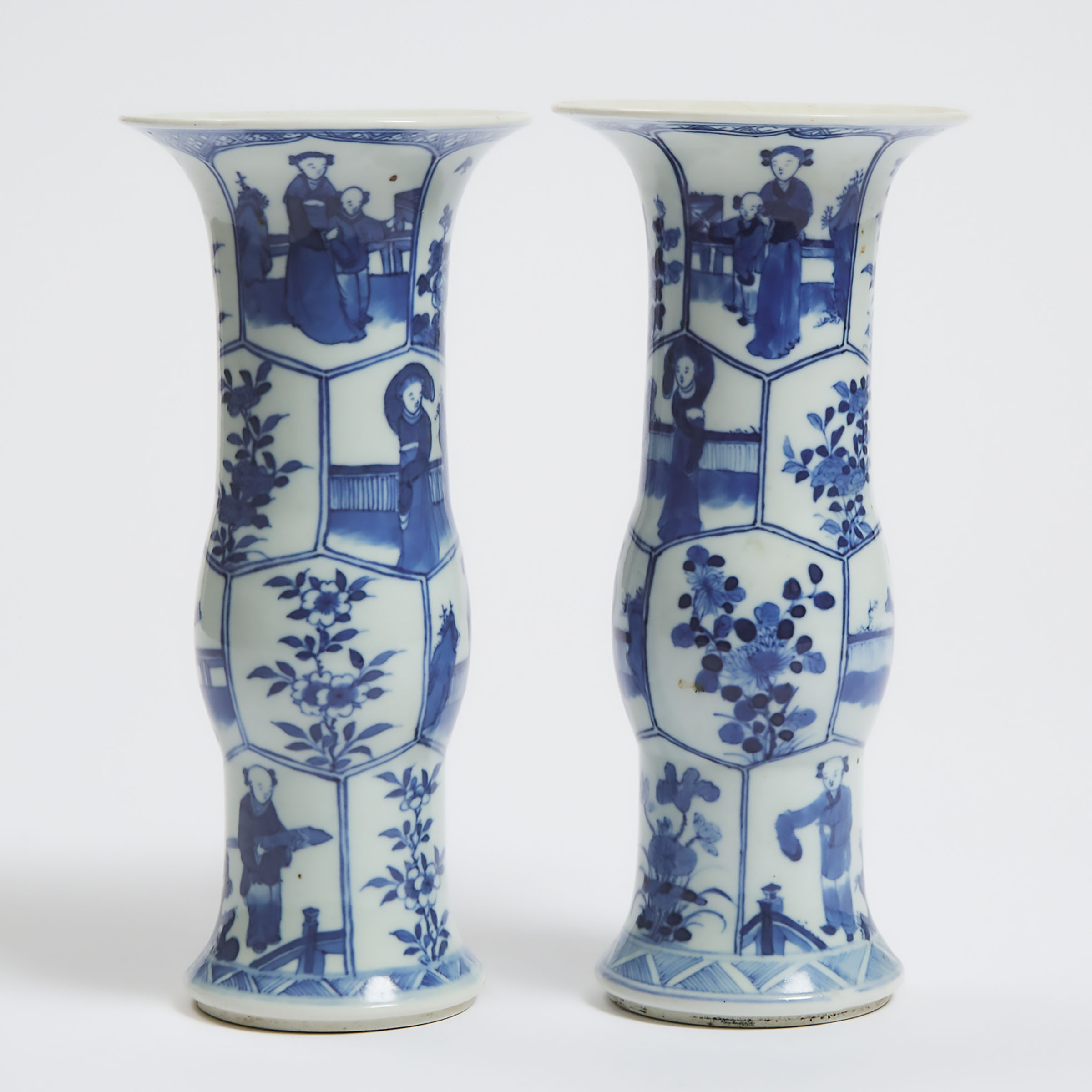 A Pair of Kangxi-Style Blue and White 'Figural' Gu Vases, 19th Century