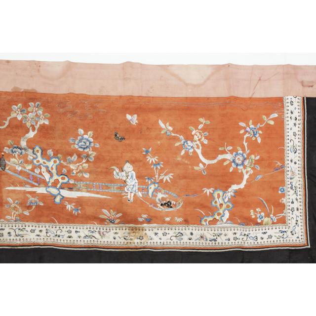 A Chinese Red Ground Embroidered 'Qilin and Boys' Hanging Panel, Qing Dynasty, 19th Century