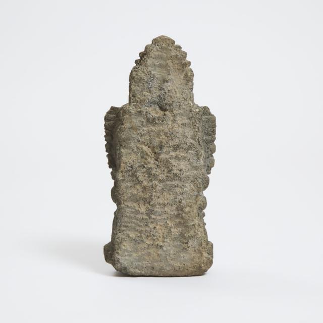 A Volcanic Stone Head of a Deity, Java, 14th Century