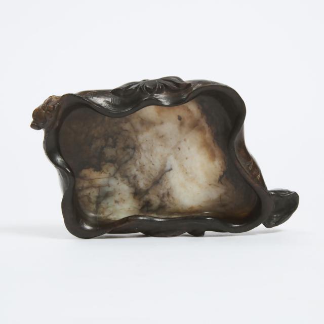 A Black, Beige and Russet Jade 'Lotus' Brush Washer, Ming Dynasty