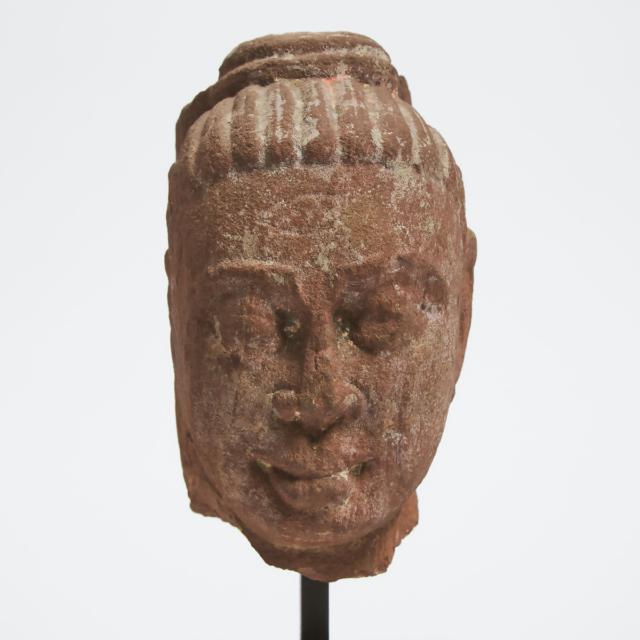 A Kushan/Mathura Red Sandstone Head of Buddha, Circa 2nd Century