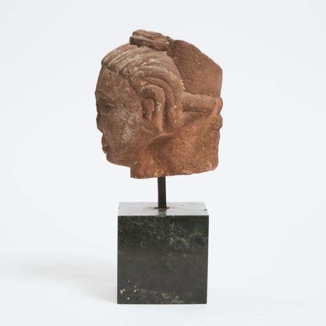 A Kushan/Mathura Red Sandstone Head of Buddha, Circa 2nd Century