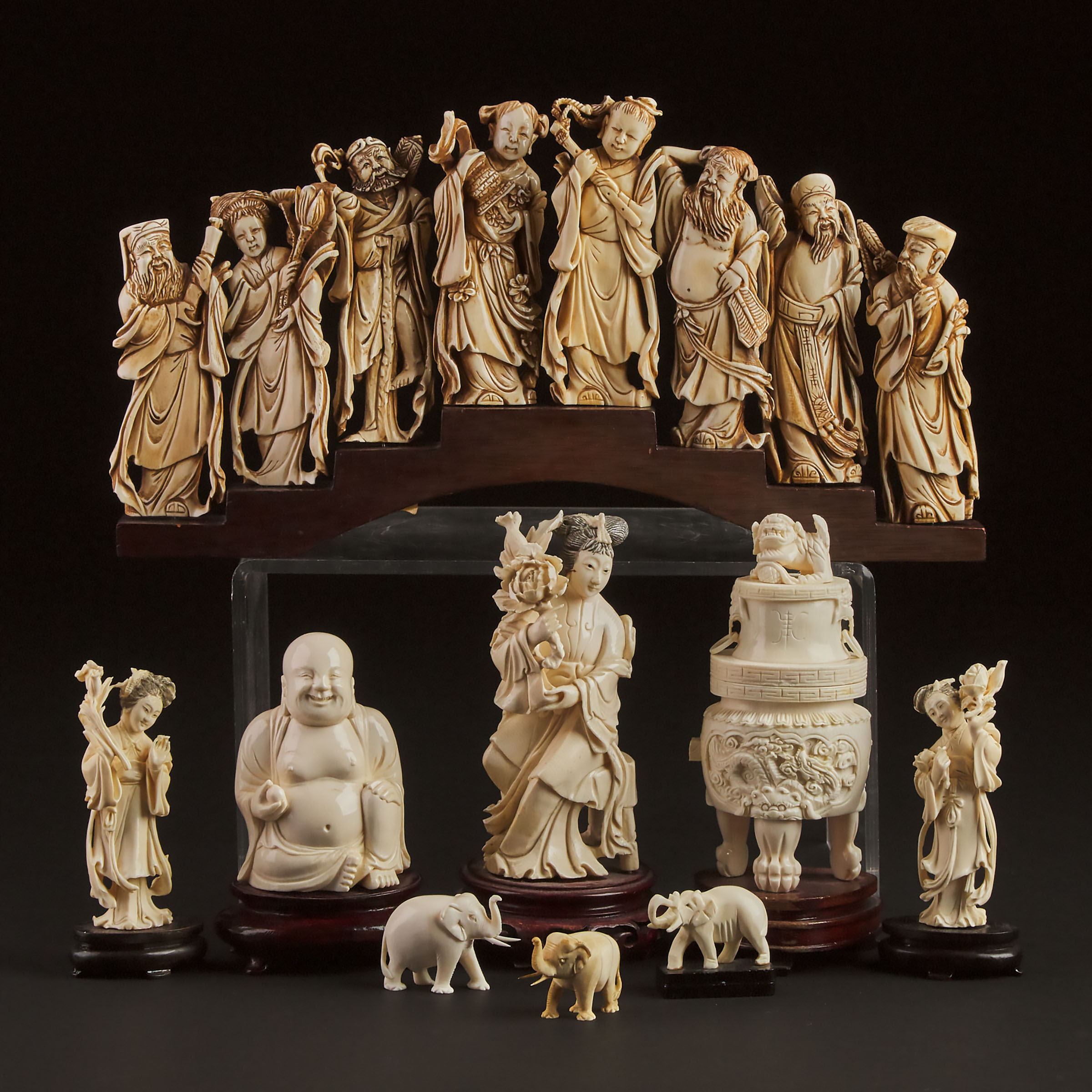A Group of Nine Chinese Ivory Carvings, Early to Mid 20th Century