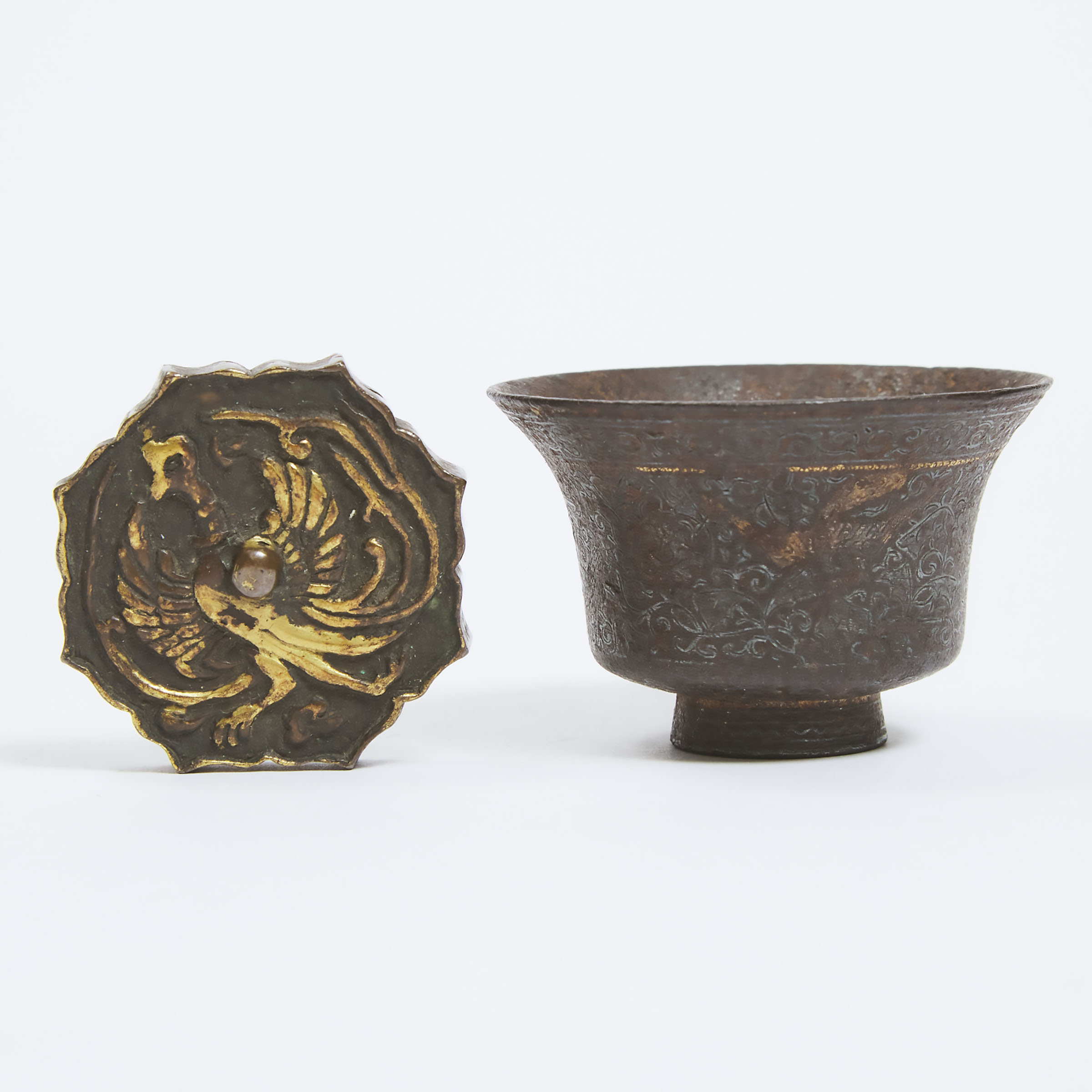 A Cast Silver Cup with Gilt Highlights, Together With a Gilt Bronze Paper Weight, Liao Dynasty or Later