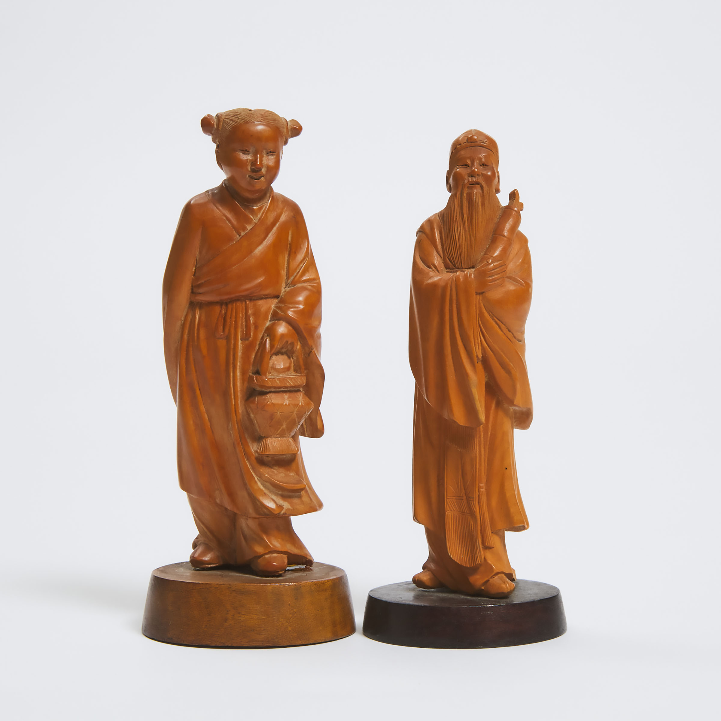 A Boxwood Figure of the Daoist Immortal Lan Caihe, Together With a Daoist Scholar, Republican Period, Early to Mid 20th Century