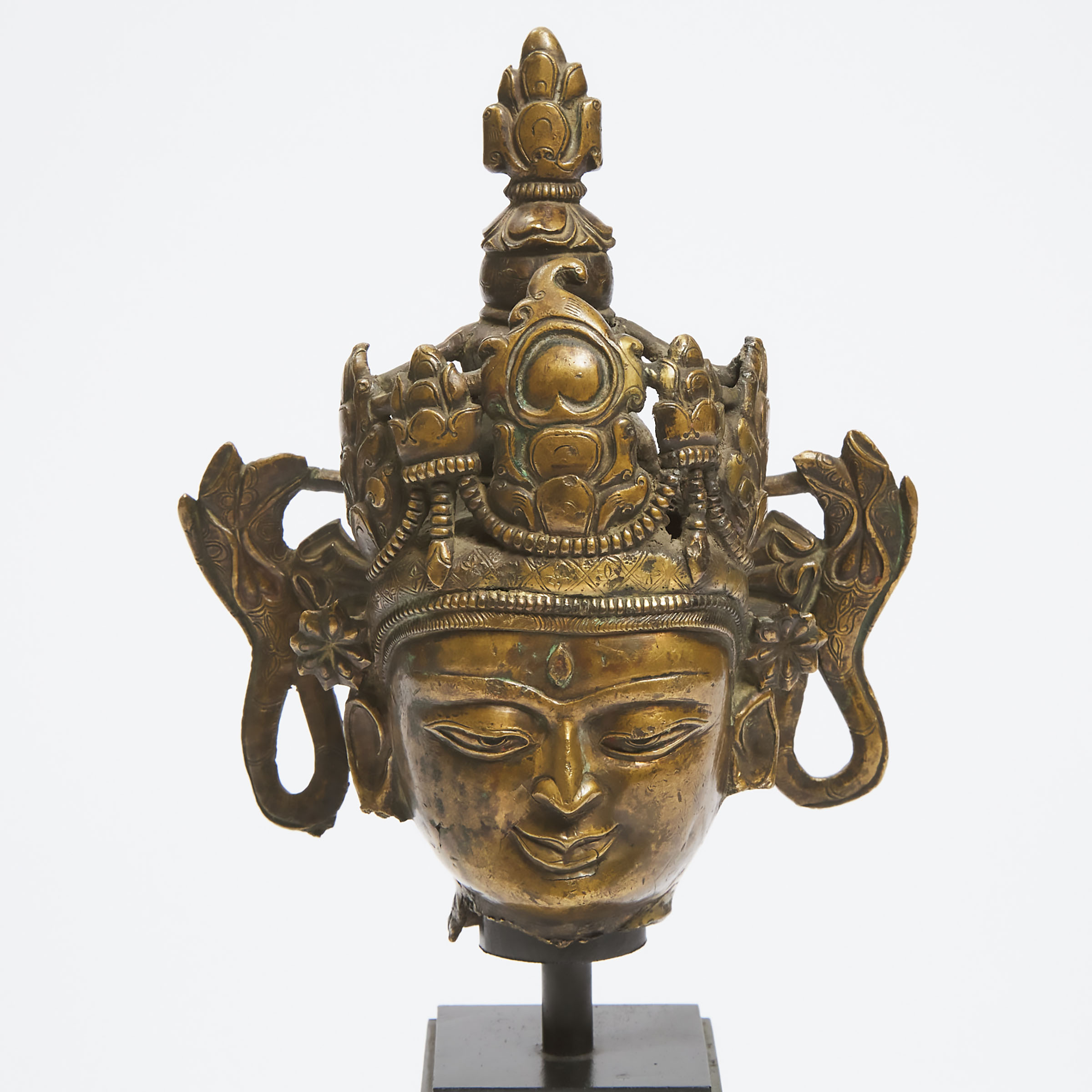 A Tibetan Bronze Head of Buddha, 15th Century