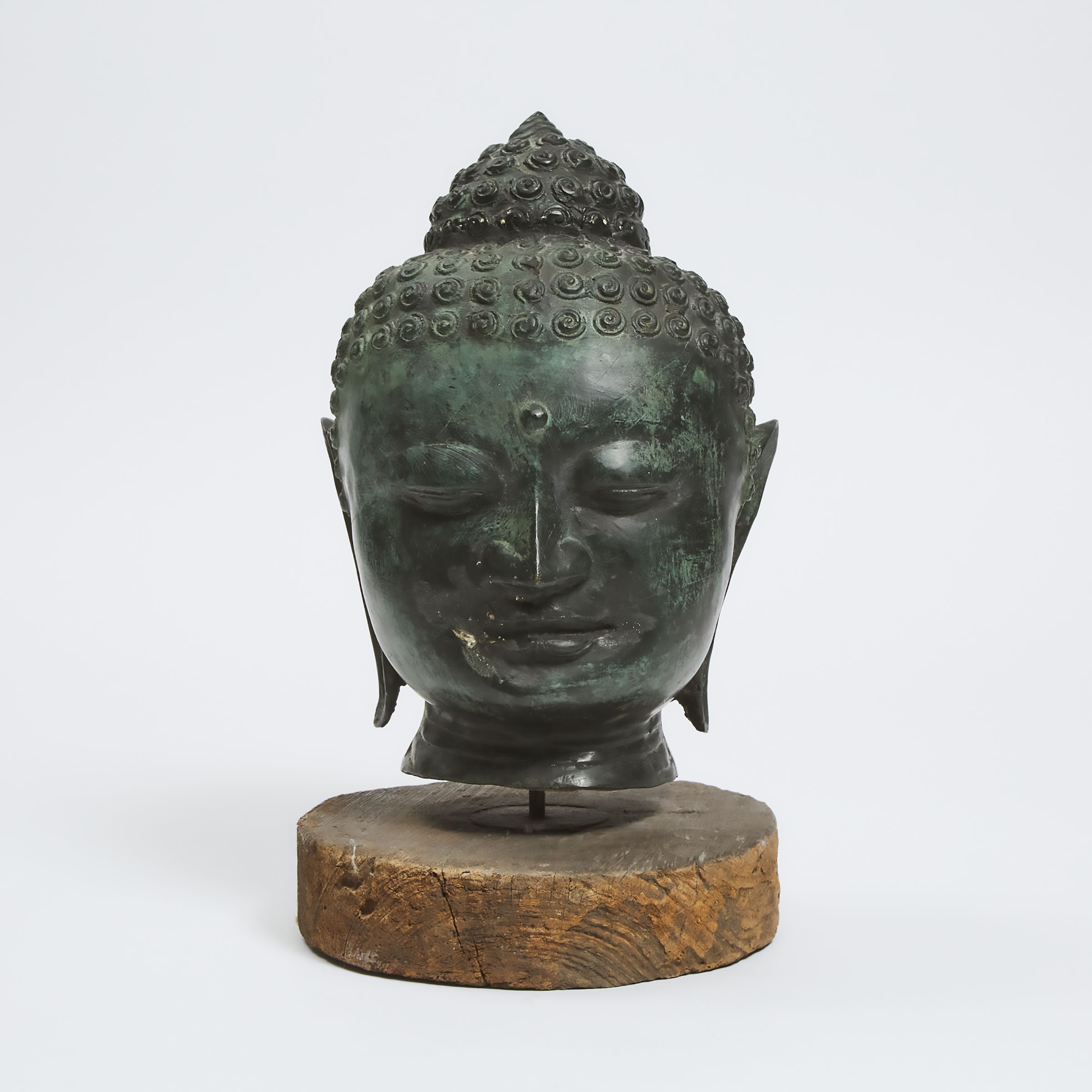 A Thai Bronze Head of Buddha, 19th/20th Century