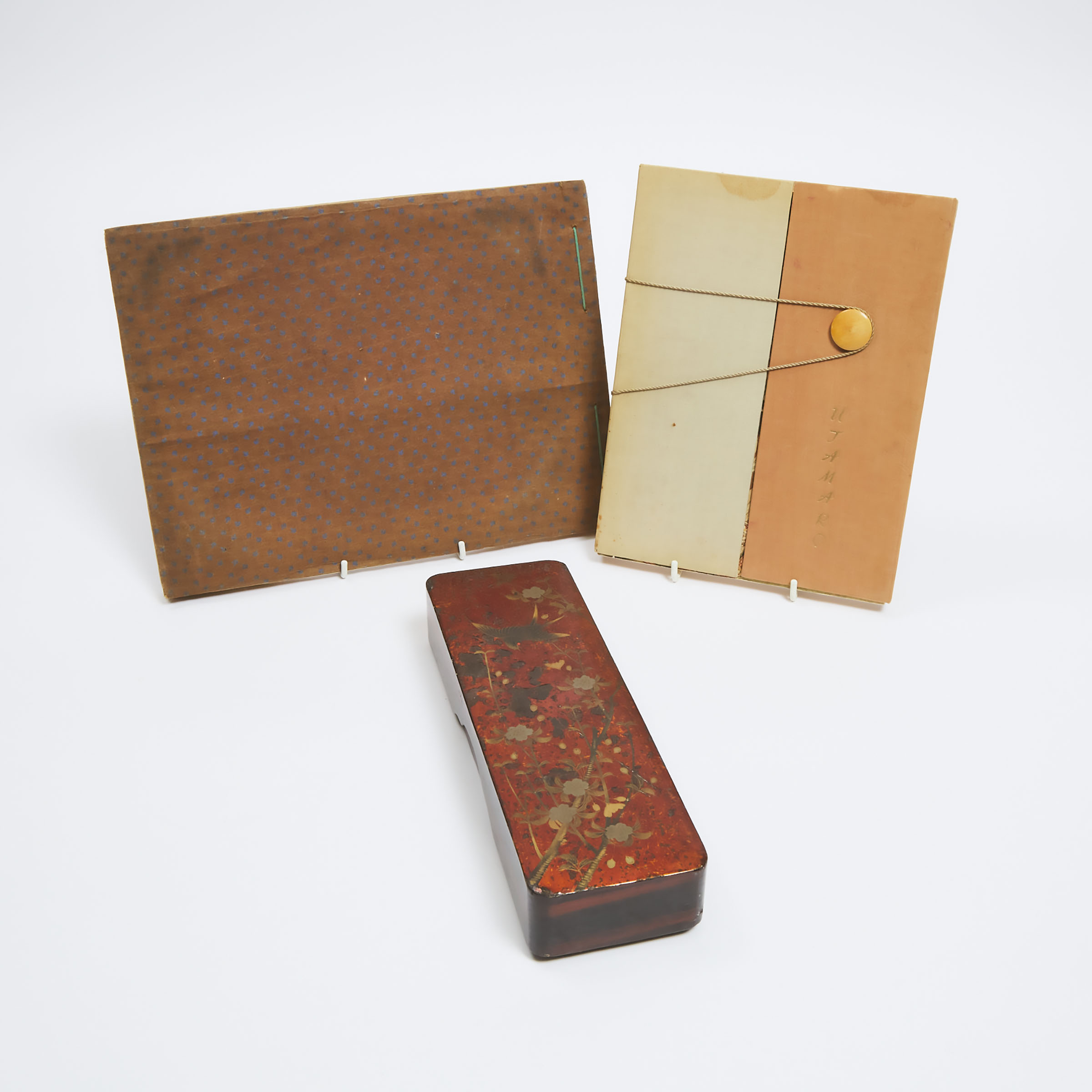 A Japanese Gilt and Lacquered 'Swallow and Cherry Blossom' Box, Meiji Period, Together With a Clothbound Photo Album and Utamaro Woodblock Reference Book
