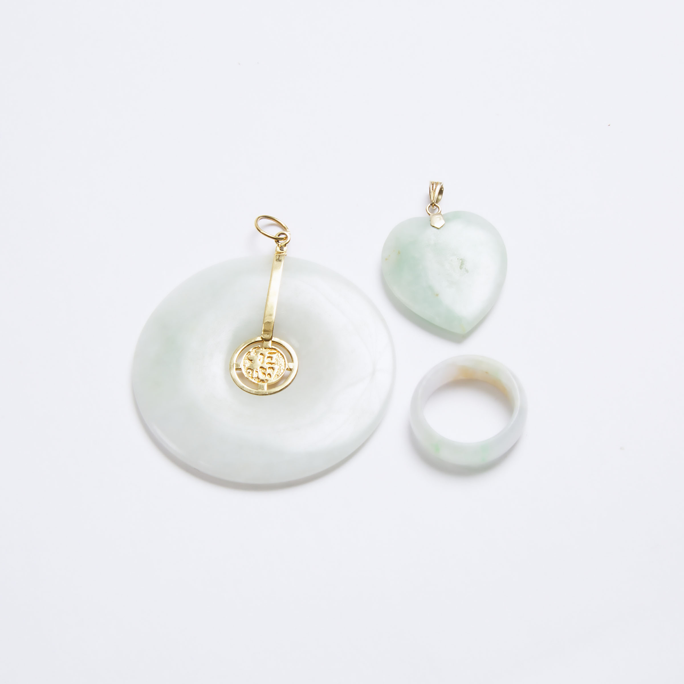 A Group of Three Natural Jadeite Jewellery, Early to Mid 20th Century