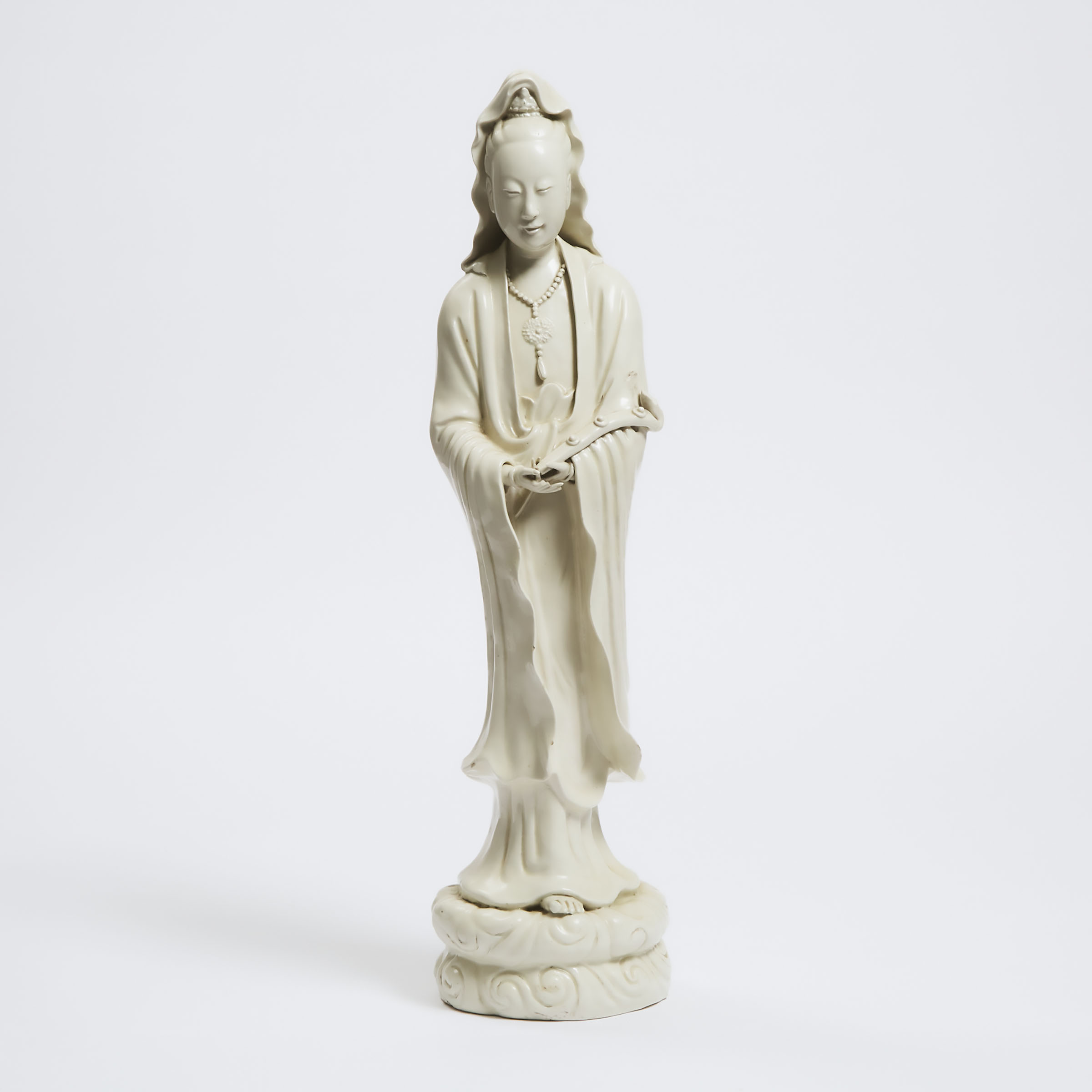 A Large Blanc de Chine Standing Figure of Guanyin