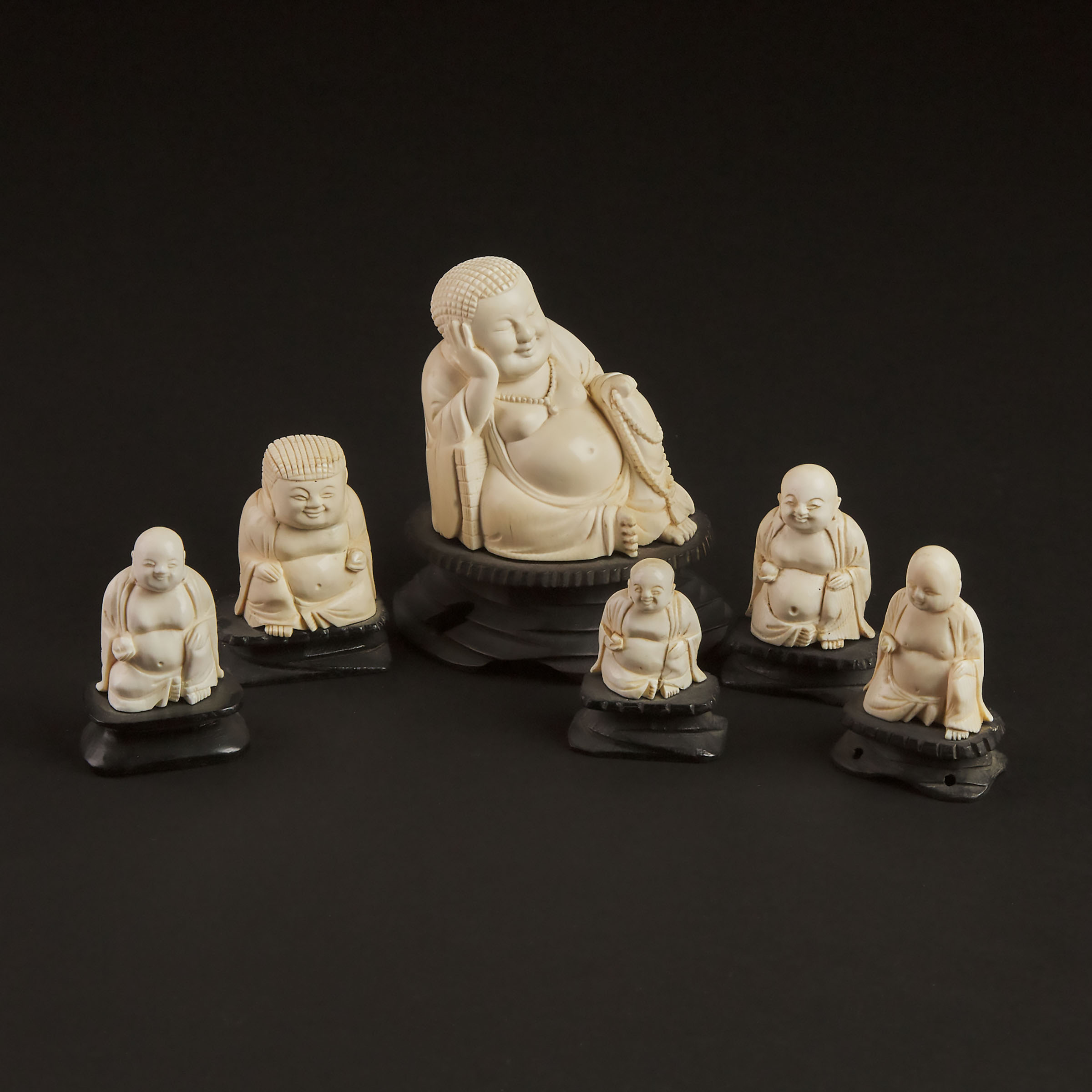 A Group of Six Ivory Figures of Buddhas, 20th Century