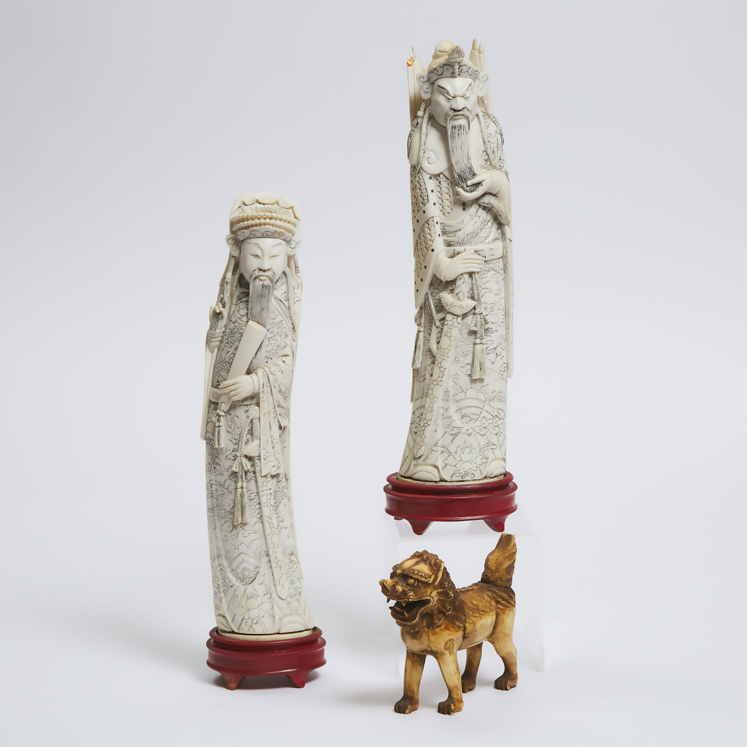 A Pair of Ivory Figures of a General and a Scholar, Together With a Foo Lion, Early to Mid 20th Century