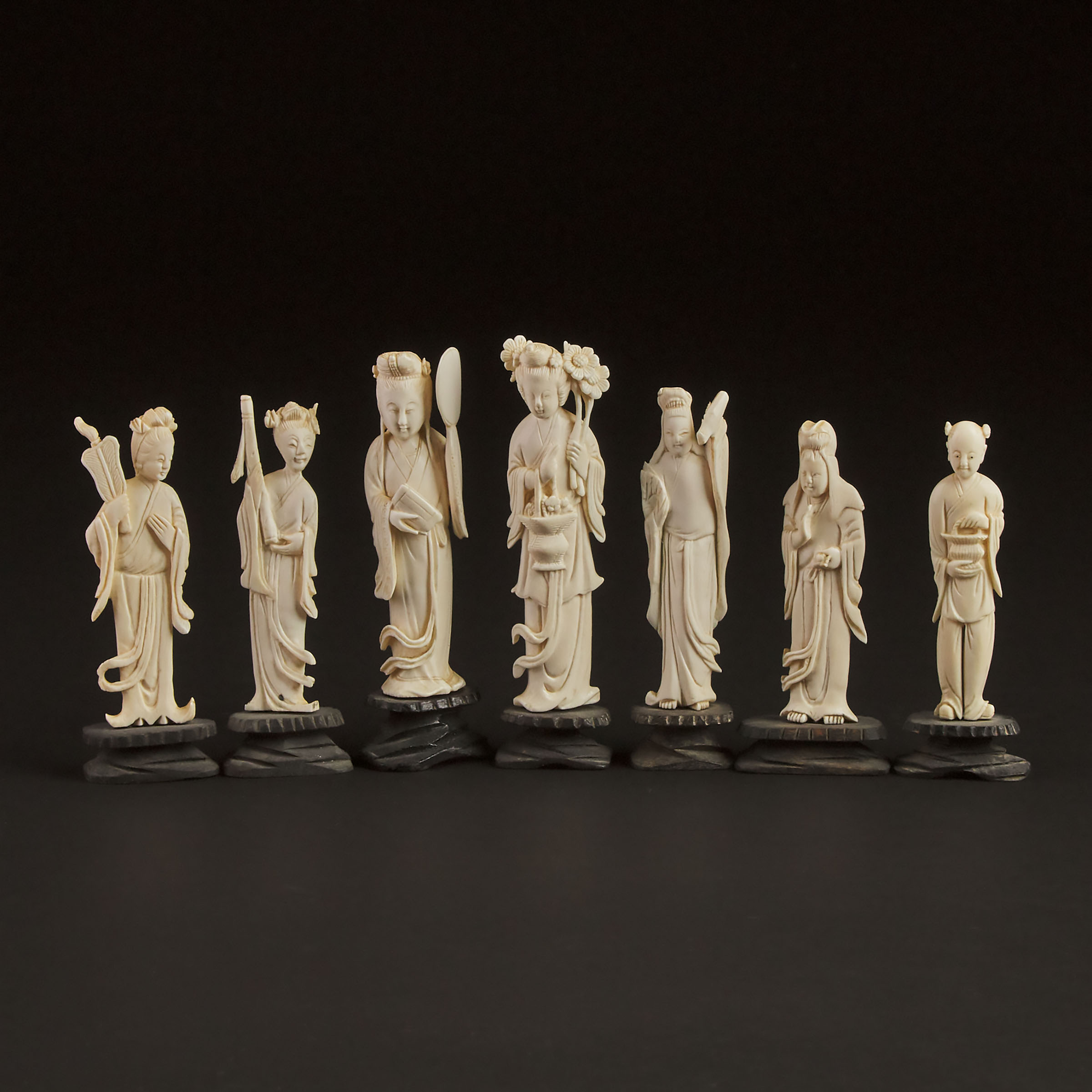 A Group of Seven Small Chinese Carved Ivory Figures, 20th Century