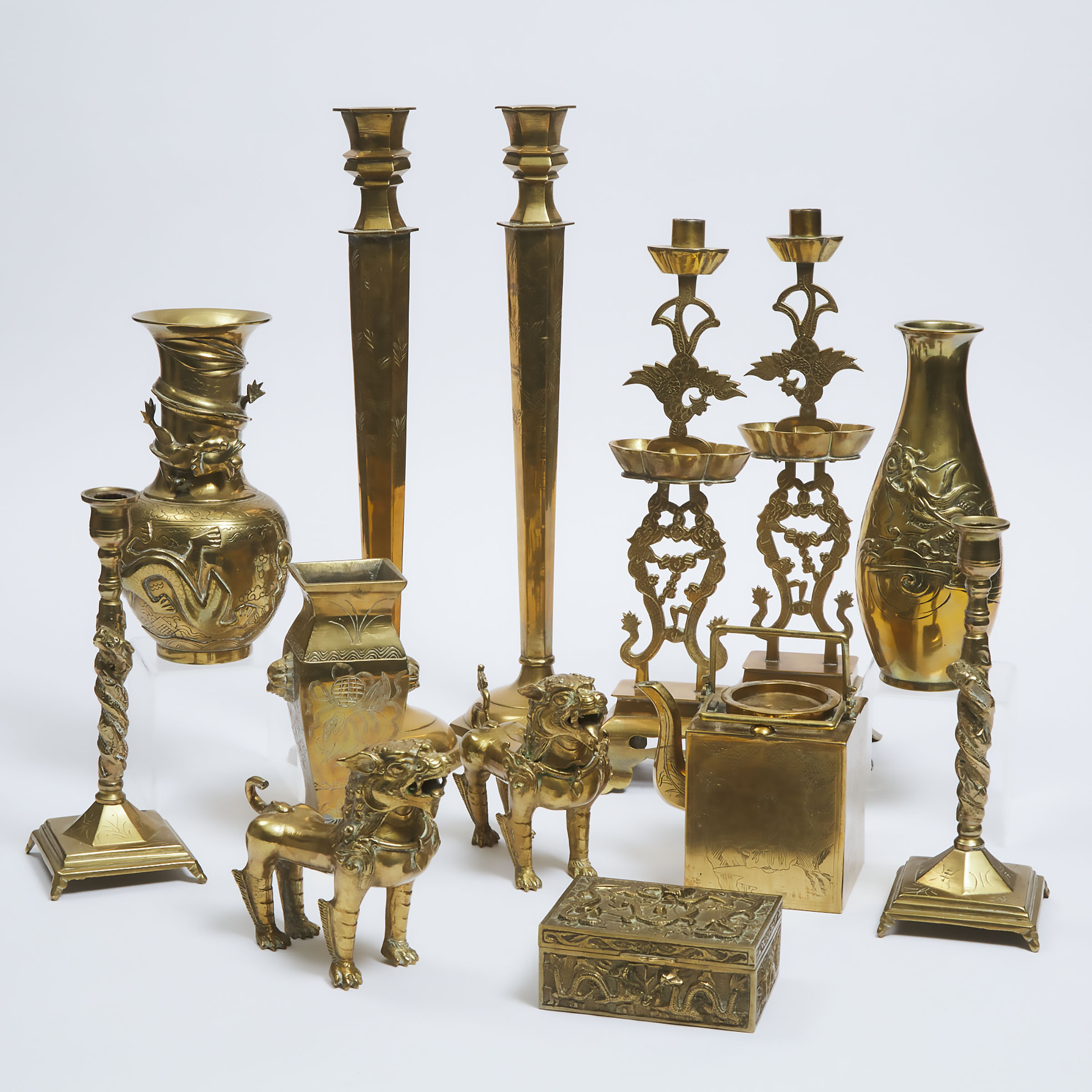 A Group of Thirteen Chinese Brass Candlesticks, Vases, and Other Wares, Early to Mid 20th Century