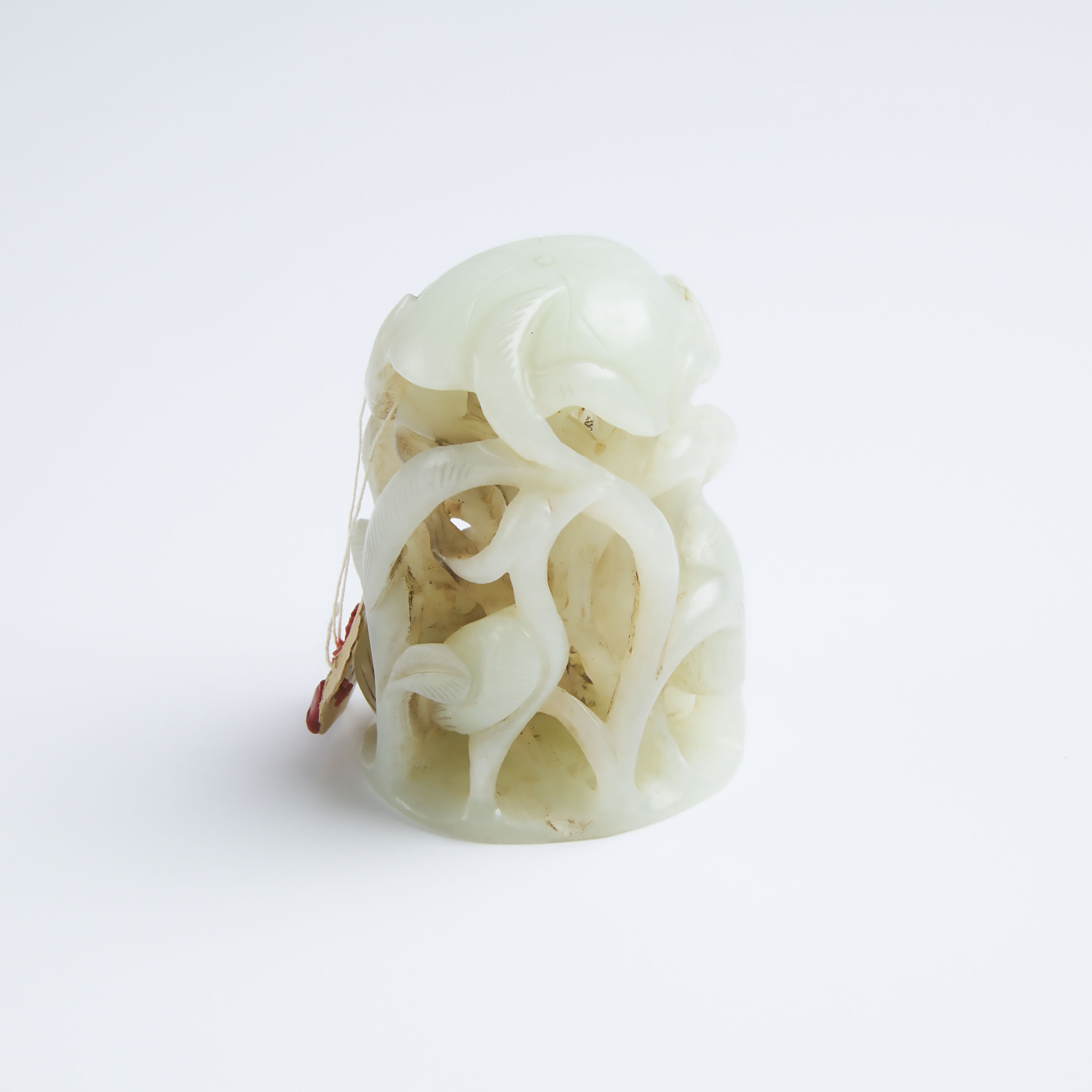 A Pale Celadon Jade Carved 'Egret and Lotus' Finial
