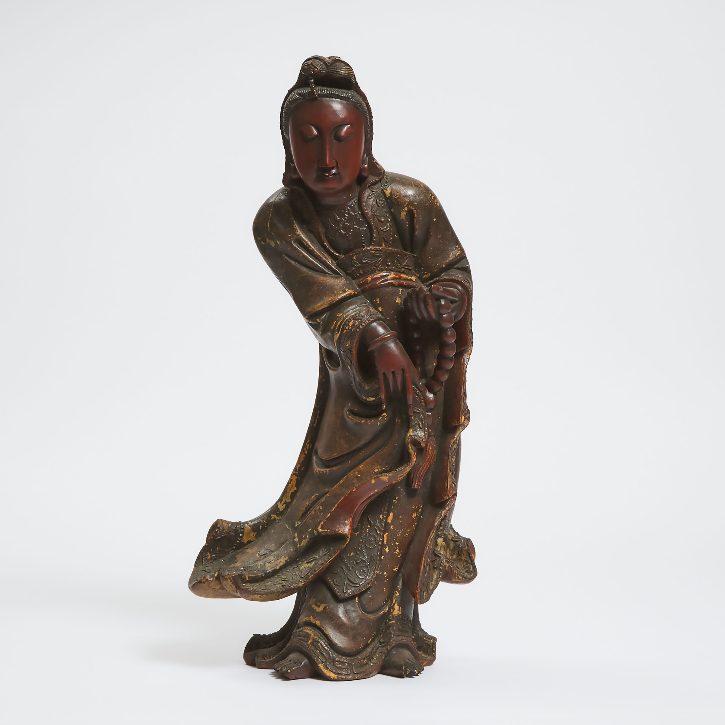 A Lacquered Wood Figure of Guanyin, Qing Dynasty, 19th Century