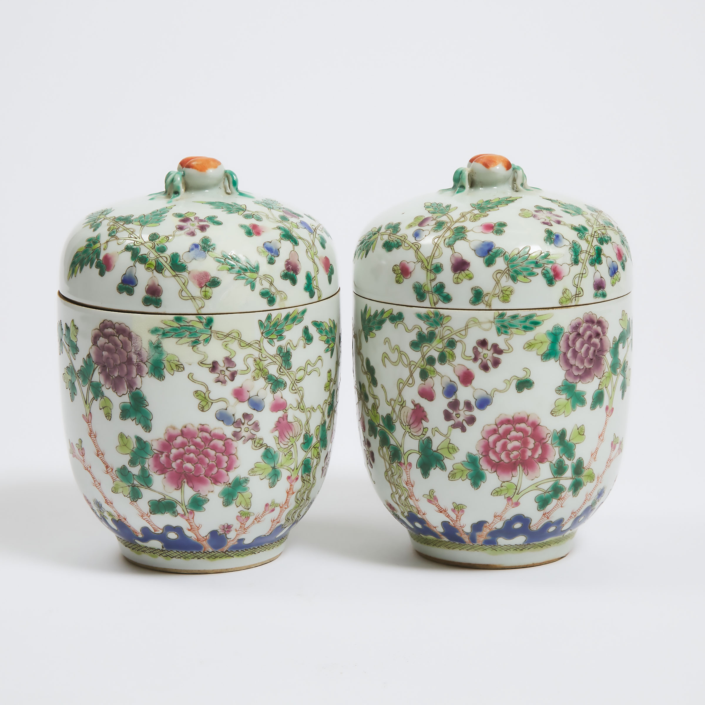 A Pair of Famille Rose 'Peony and Fruit' Jars and Covers, Hongxian Mark, Republican Period
