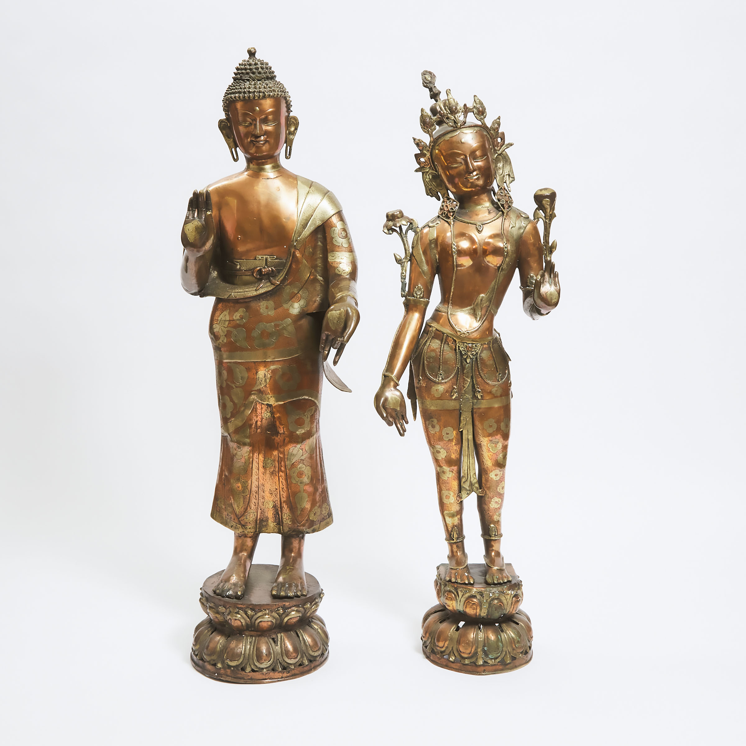 Two Massive Nepalese Brass Standing Figures of Buddha Shakyamuni and Standing Tara, 20th Century