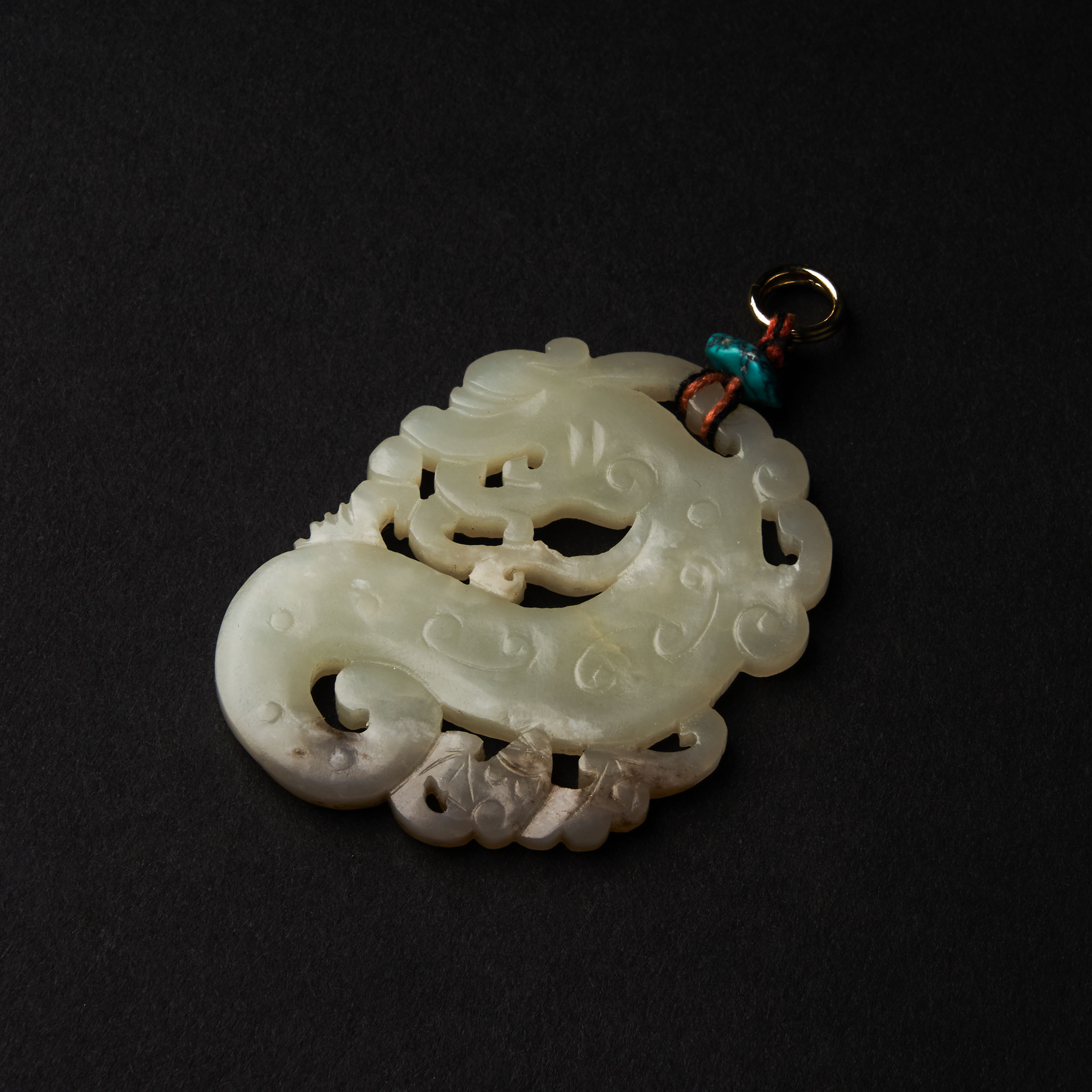 A White Jade 'Dragon and Bat' Pendant, Late Ming/Early Qing Dynasty, 16th/17th Century