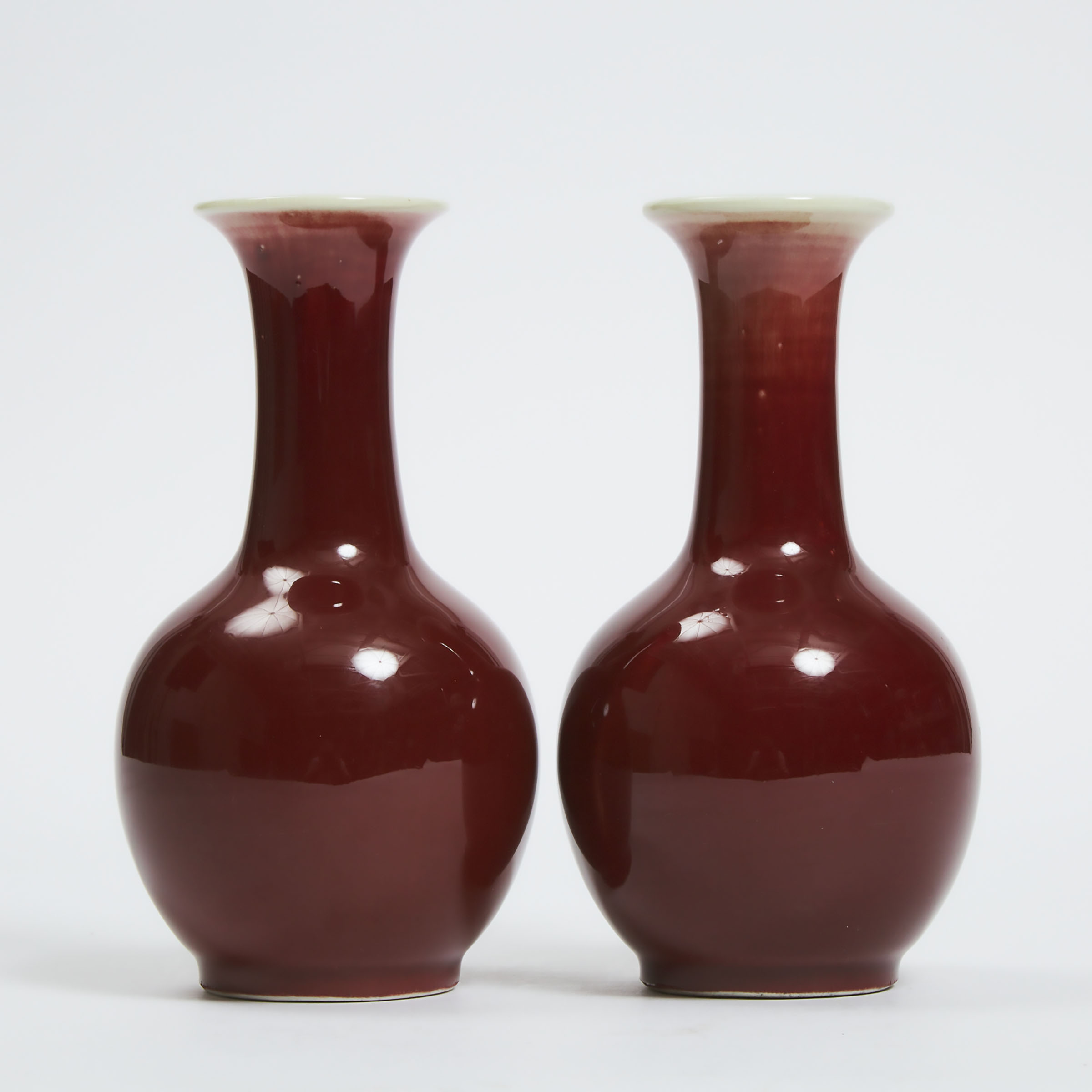A Pair of Langyao Red Glazed Bottle Vases, Mid 20th Century
