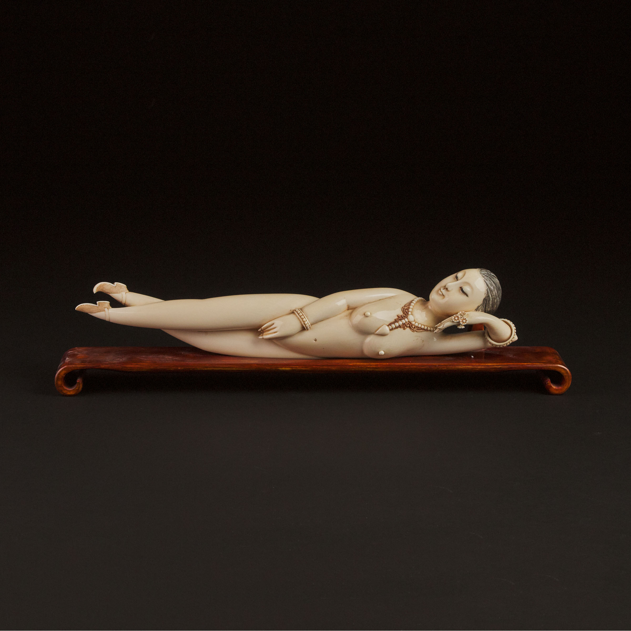 A Large Ivory Figure of a Reclining Lady, 'Medicine/Doctor's Doll', Early to Mid 20th Century