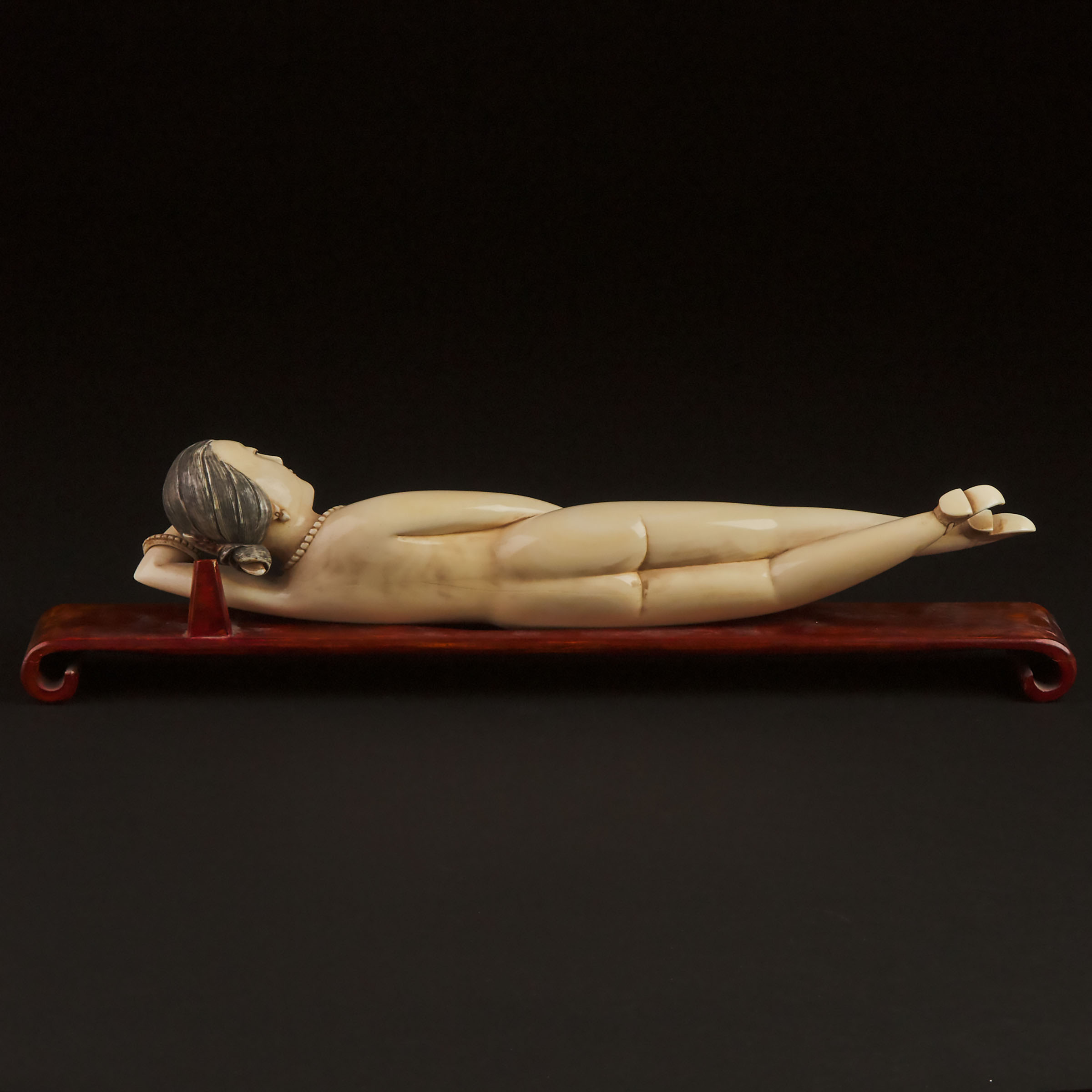 A Large Ivory Figure of a Reclining Lady, 'Medicine/Doctor's Doll', Early to Mid 20th Century