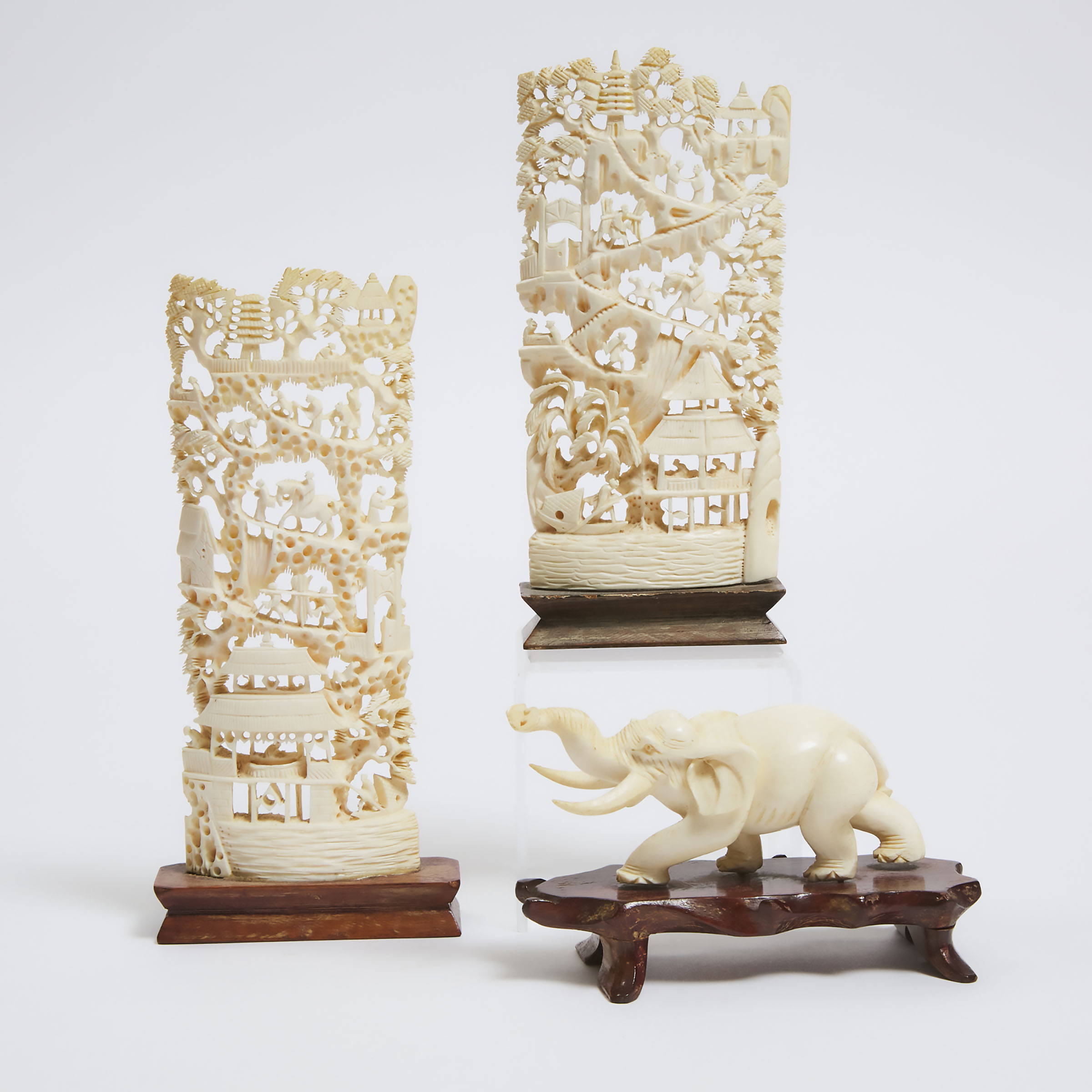 Two Chinese Ivory Landscape Carvings, Together With an Elephant