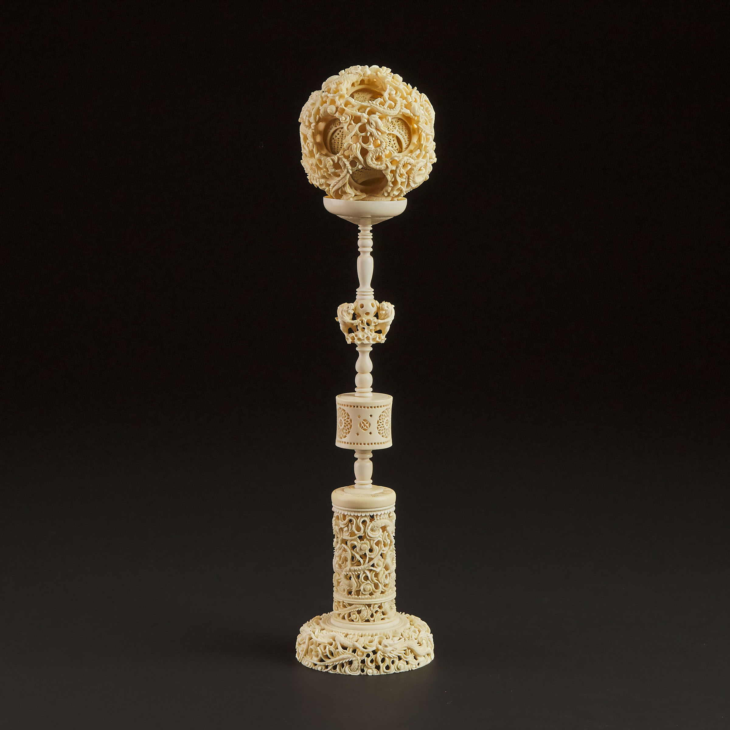 A Large Chinese Ivory Puzzle Ball and Stand, Early 20th Century
