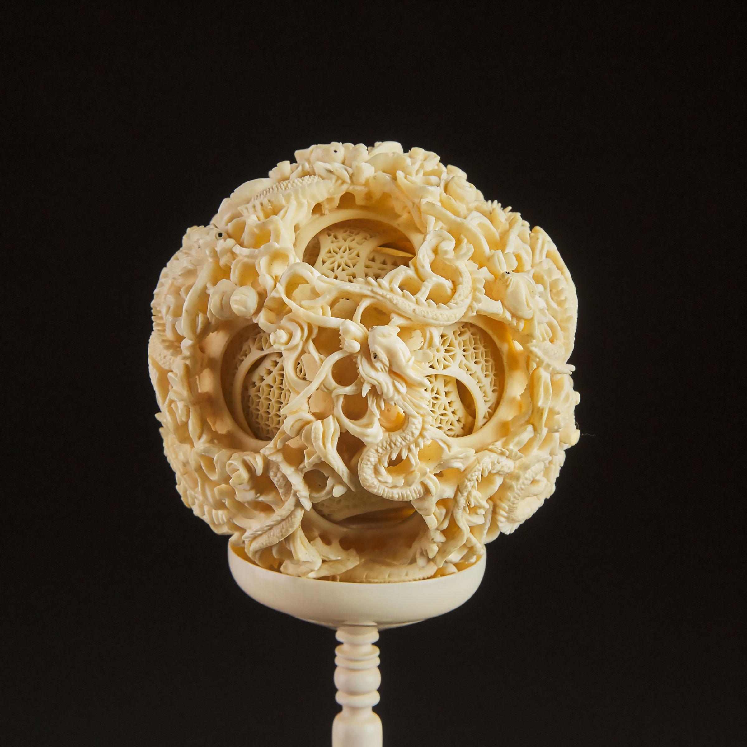 A Large Chinese Ivory Puzzle Ball and Stand, Early 20th Century