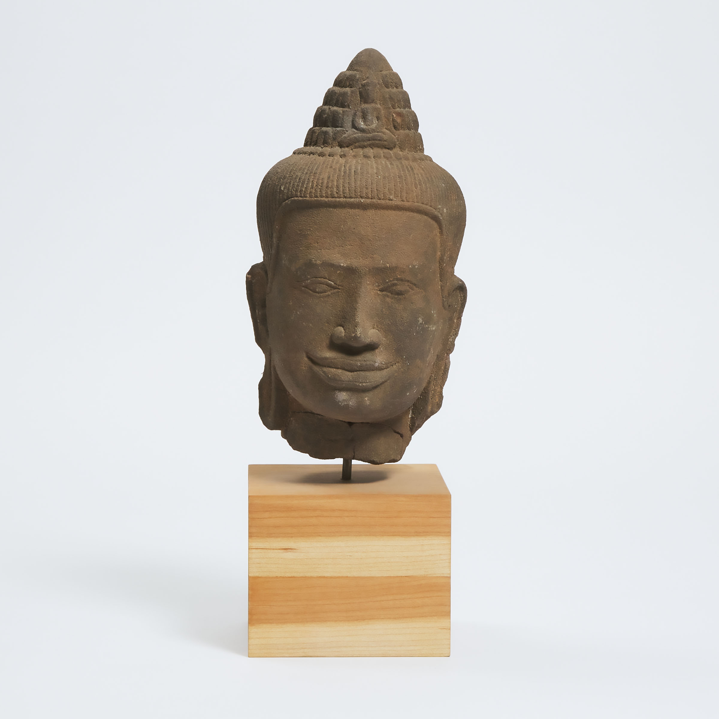 A Khmer Stone Head of Avalokiteshvara, Cambodia, 14th Century