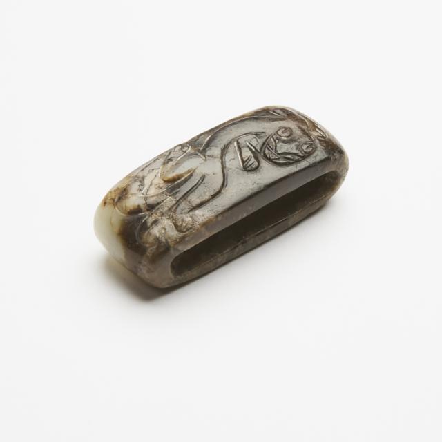 An Archaistic White and Russet Jade 'Chilong' Scabbard Slide, Ming Dynasty (1368-1644)