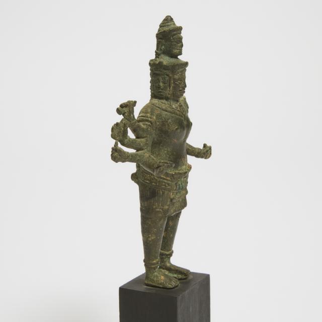 A Khmer Bronze Figure of Shiva, 14th Century